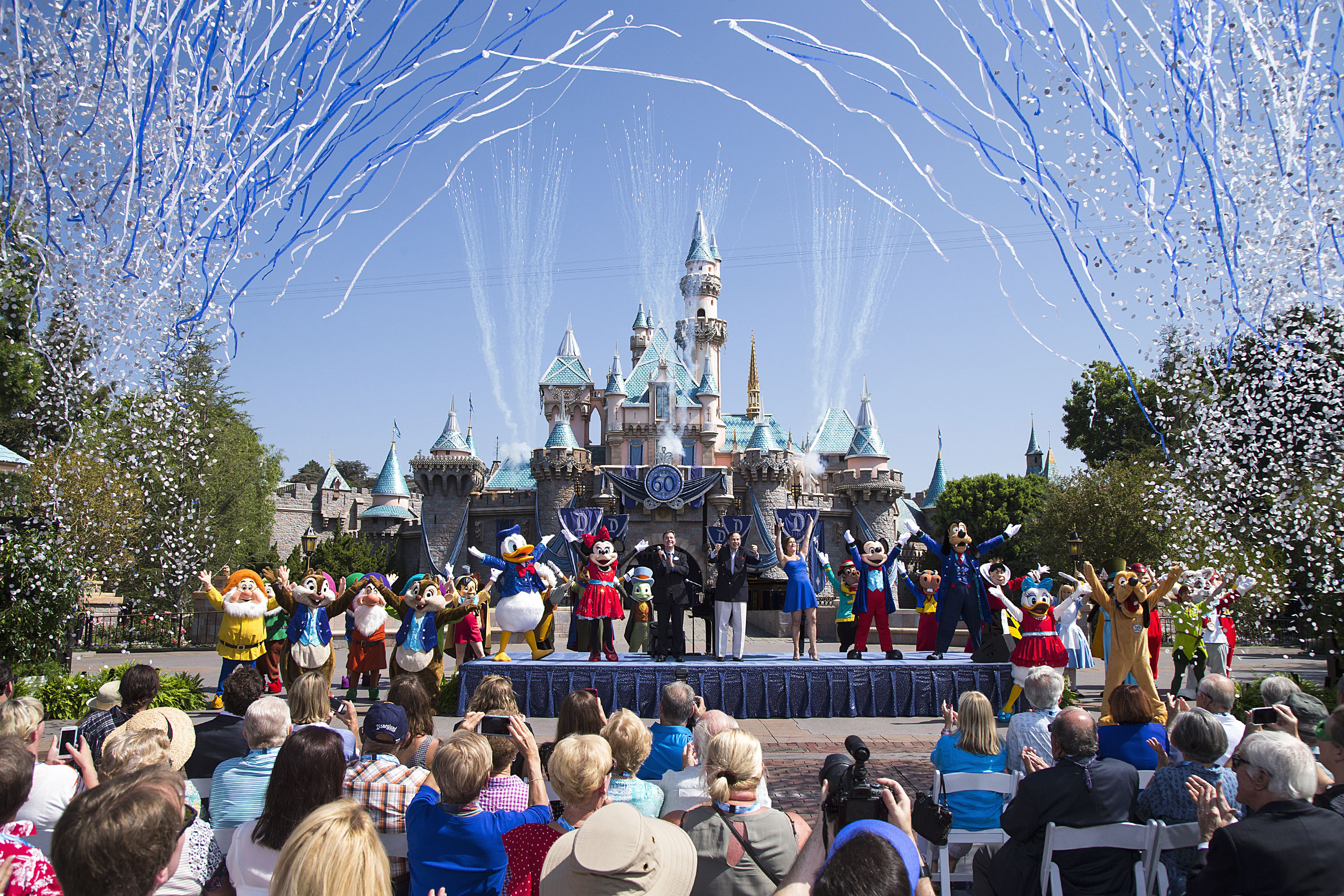 Mickey Mouse and his friends celebrate the 60th anniversary of Disneyland park during a ceremony at Sleeping Beauty Castle in Anaheim, Calif. on Friday, July 17 (Handout—©2015 Disney Enterprises, Inc.)