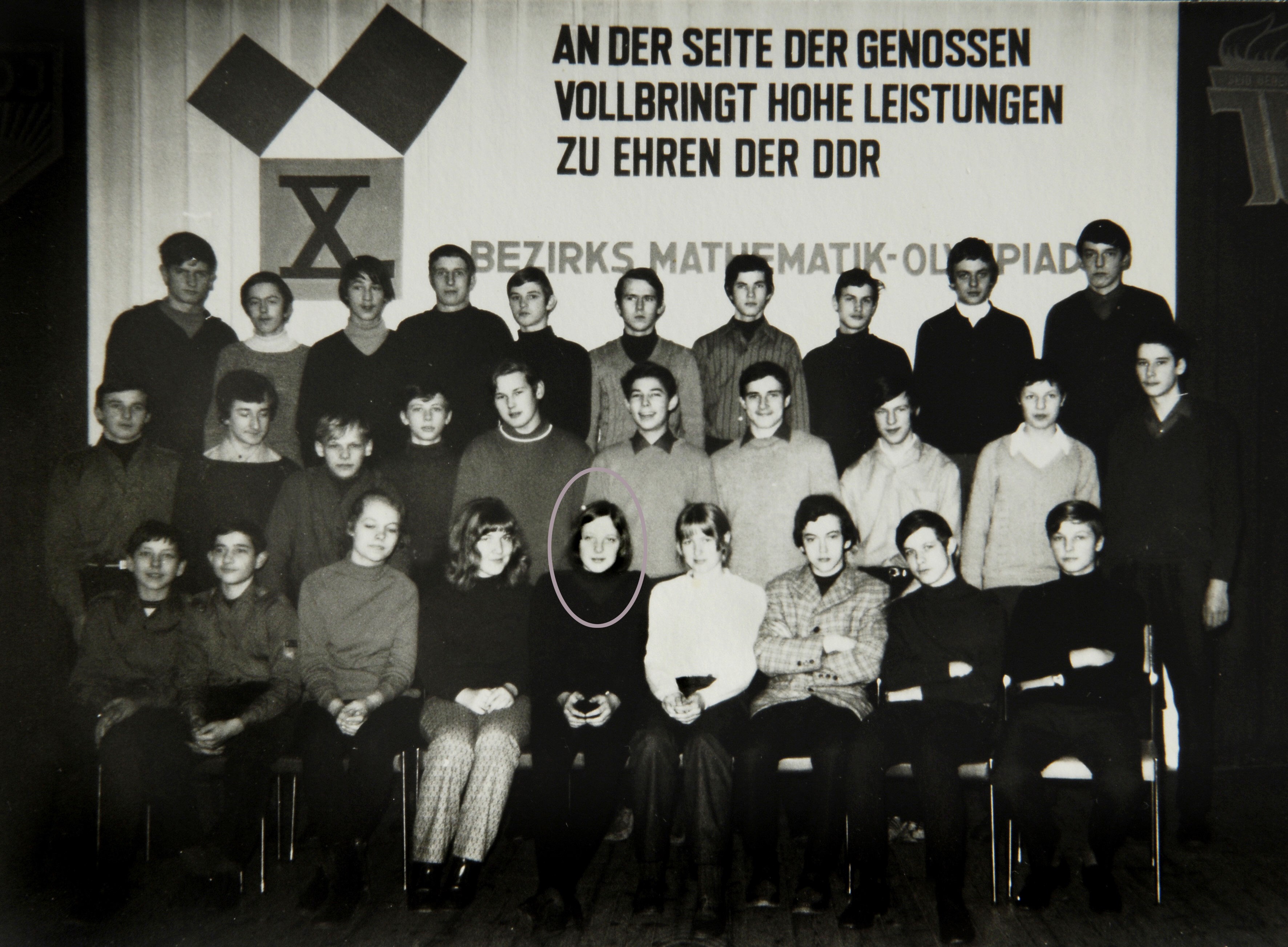 Angela Kasner posing for a group photo during the Mathematics Olympiad in Teterow, Germany, in 1971.