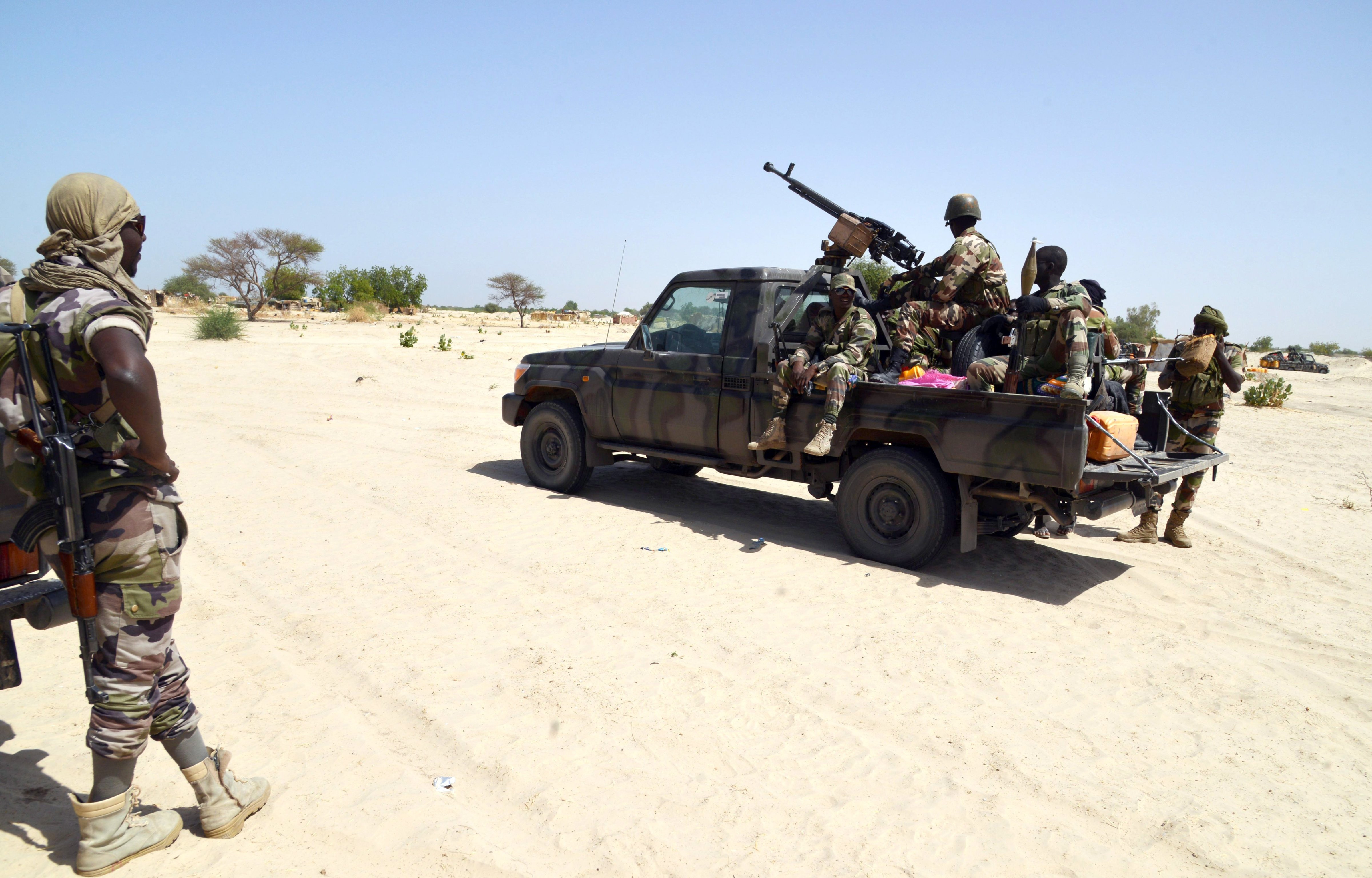 Niger soldiers ride in a military vehicle on May 25, 2015 in Malam Fatori, in northern Nigeria, near the border with Nige. (Issouf Sanogo—AFP/Getty Images)