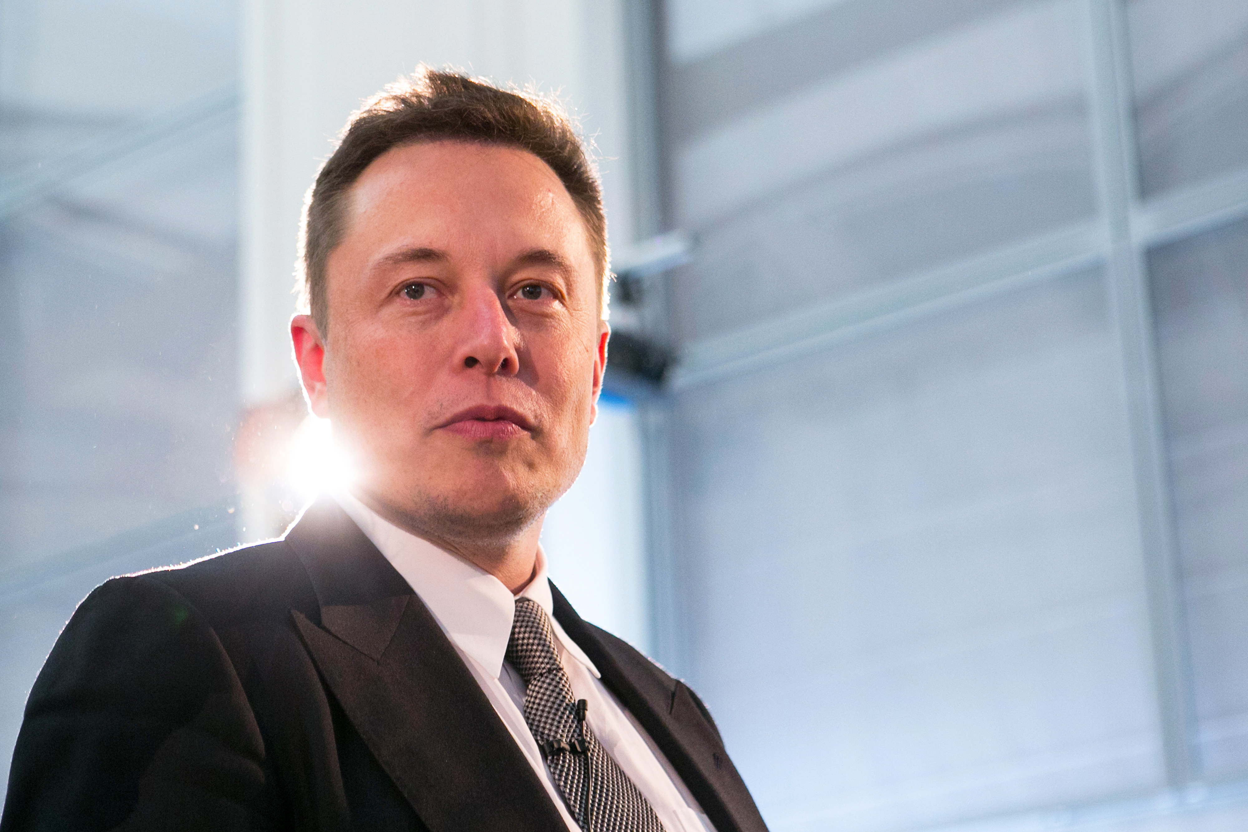 Elon Musk arrives for a news conference in Berlin, on Sept. 24, 2015. (Krisztian Bocsi—Bloomberg/Getty Images)