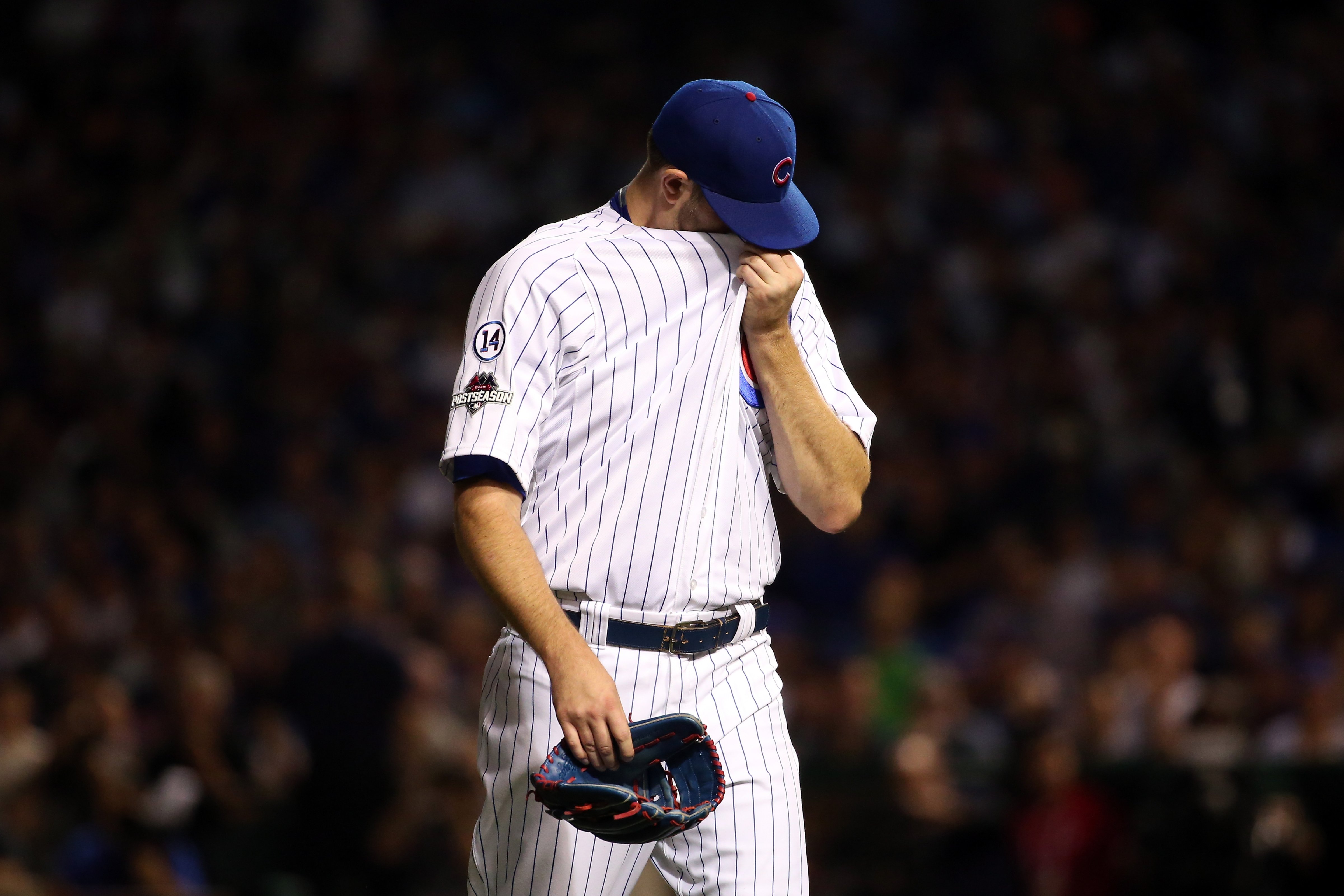 Jason Hammel #39 of the Chicago Cubs walks off the field in the second inning against the New York Mets in the 2015 MLB National League Championship Series at Wrigley Field on Oct.21, 2015 in Chicago, Illinois. (Jonathan Daniel—;Getty Images)