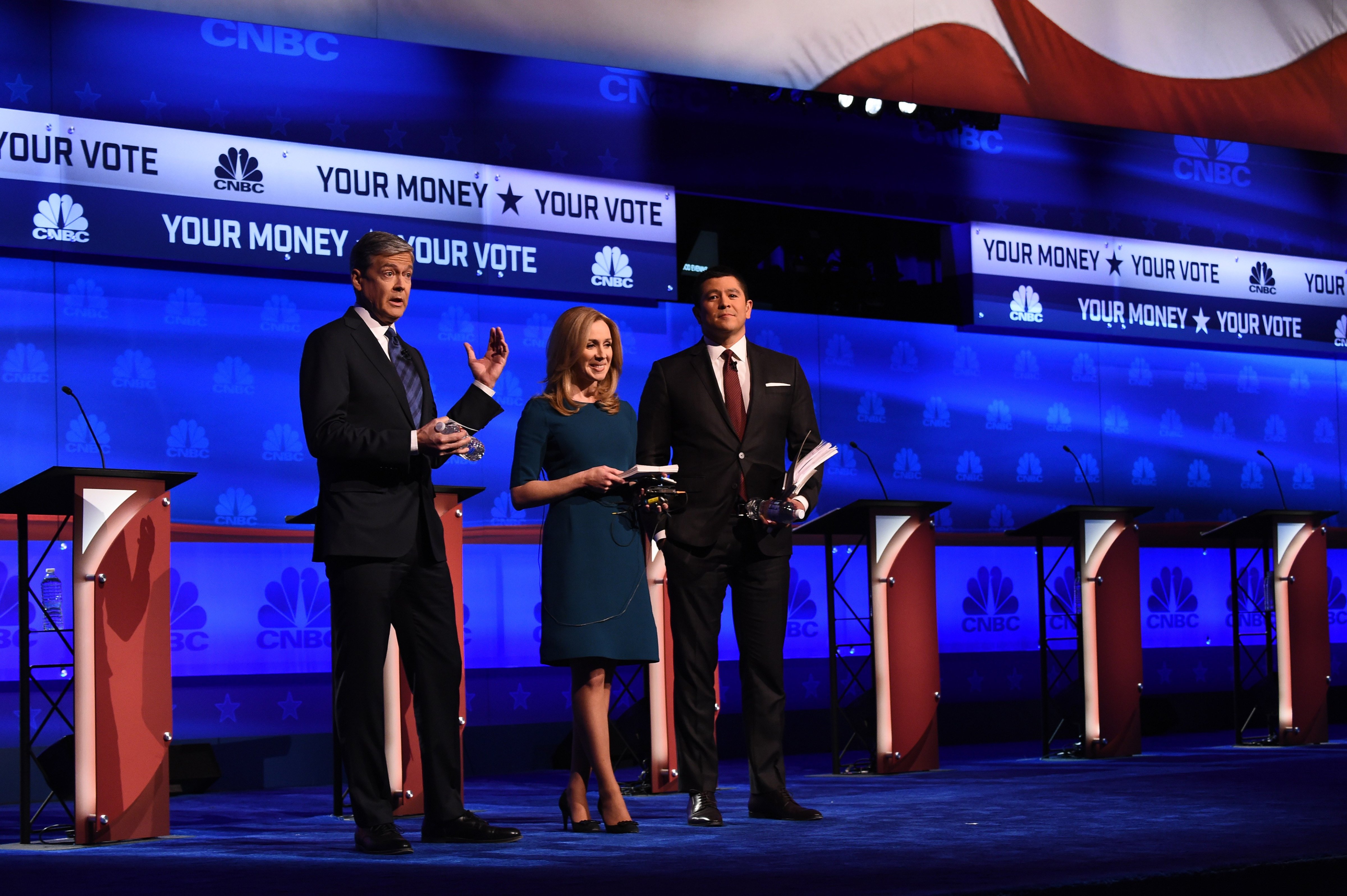 Debate moderators John Harwood (L), Becky Quick (C) and Carl Quintanilla take the stage at the third Republican Presidential Debate hosted by CNBC, October 28, 2015 at the Coors Event Center at the University of Colorado in Boulder, Colorado.  AFP PHOTO / ROBYN BECK        (Photo credit should read ROBYN BECK/AFP/Getty Images) (ROBYN BECK&mdash;AFP/Getty Images)