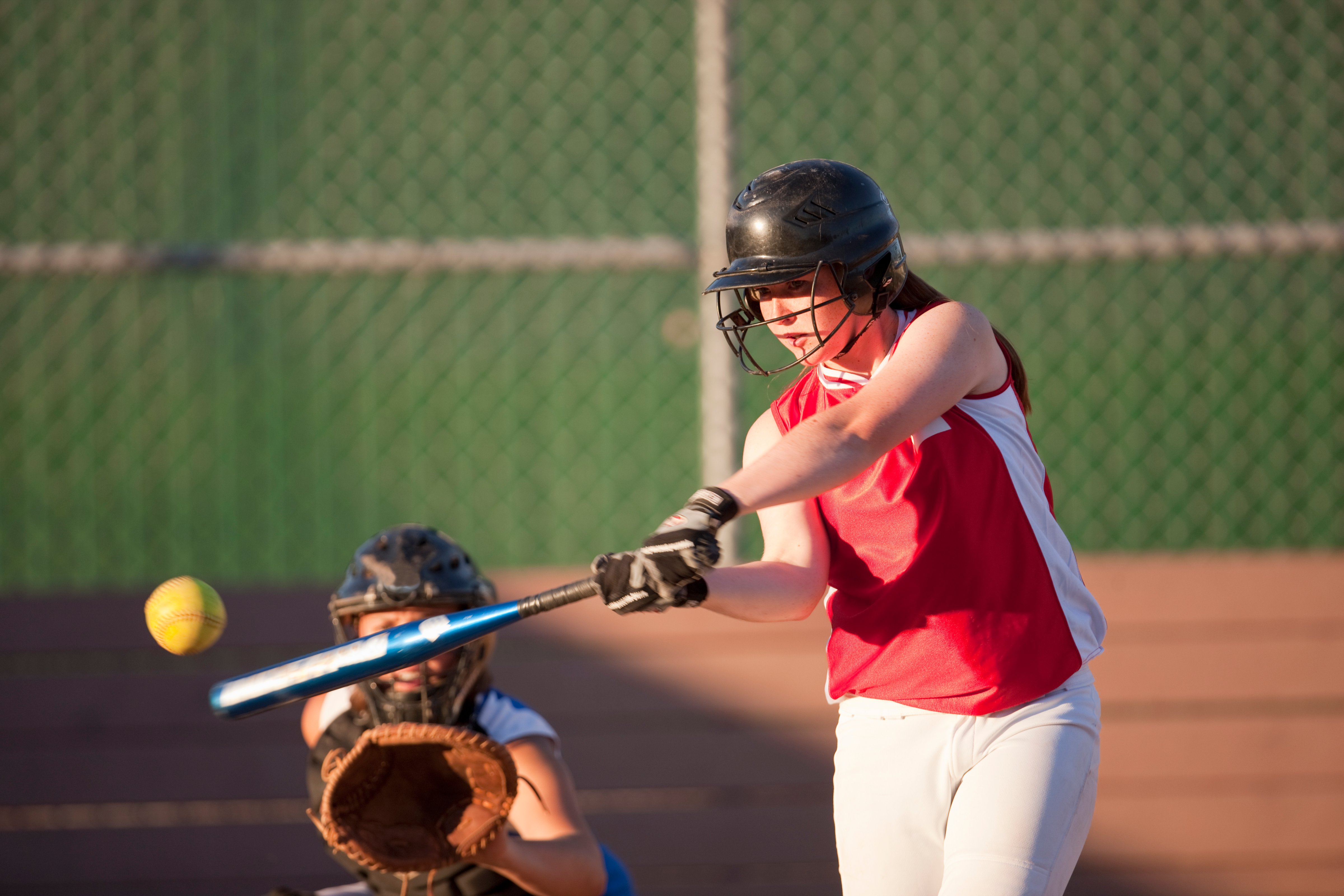 girl-playing-softball