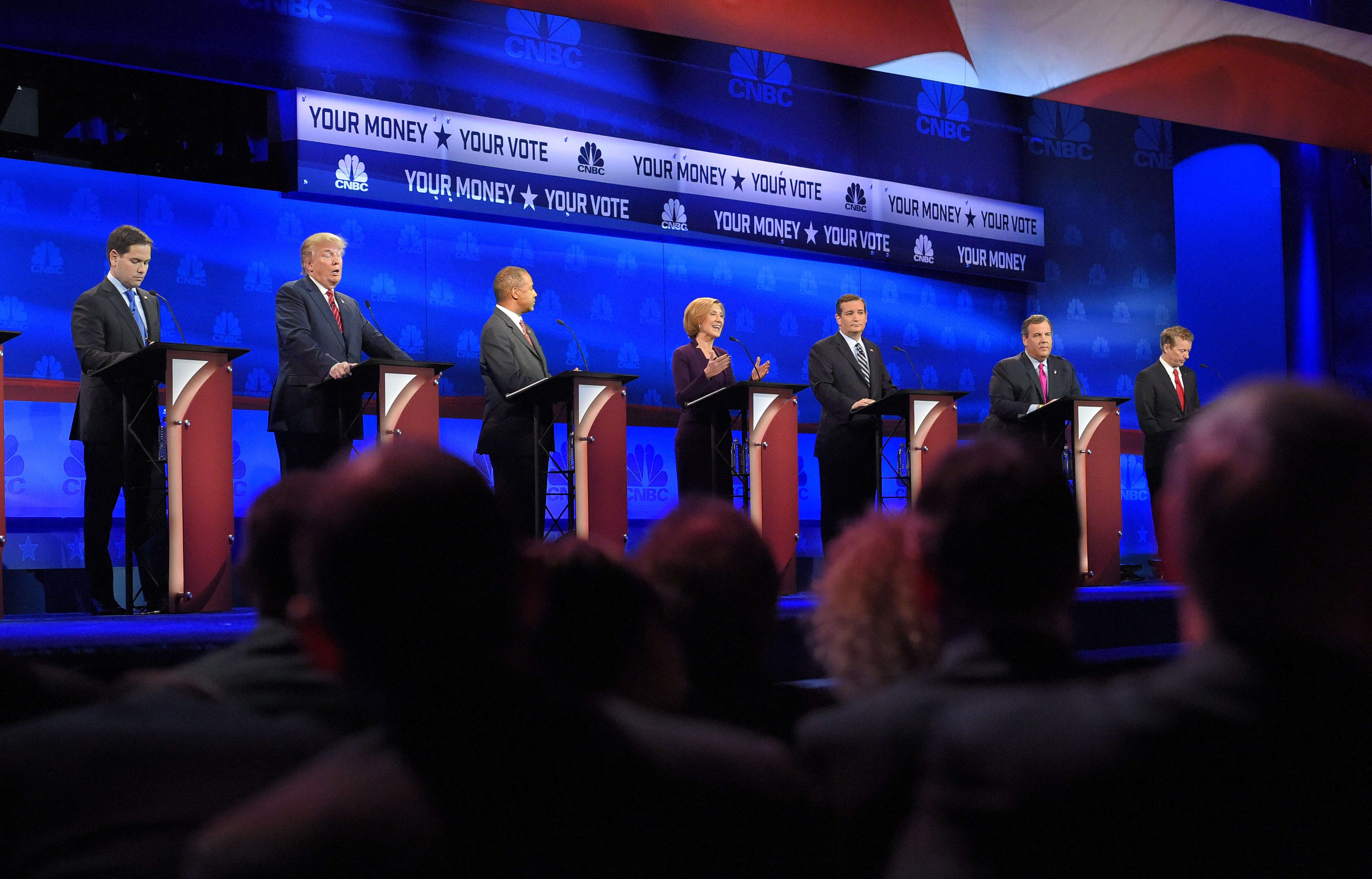Republican presidential candidates, from left, Marco Rubio, Donald Trump, Ben Carson, Carly Fiorina, Ted Cruz, Chris Christie, and Rand Paul take the stage during the CNBC Republican presidential debate at the University of Colorado on Oct. 28, 2015, in Boulder, Colo. (Mark J. Terrill—AP)