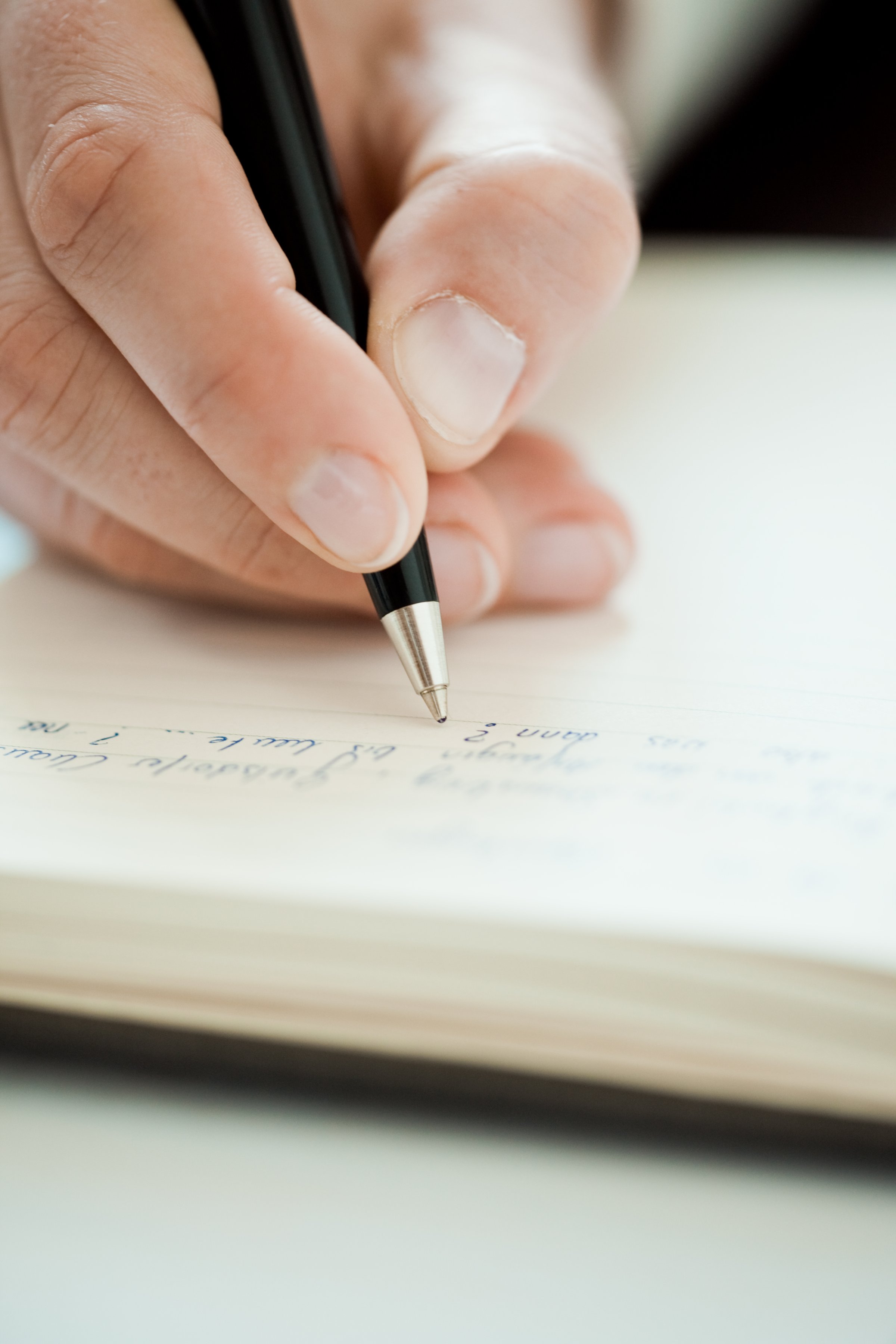 hand-writing-pen-notebook