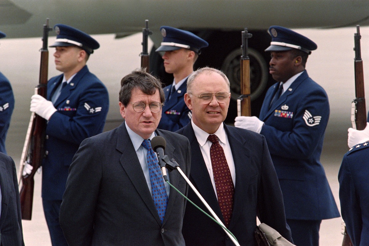 US Assistant Secretary of State and US peace negotiator for Bosnia, Richard Holbrooke (L), delivers statements Oct. 31, 1995, upon arrival at Wright Patterson Air Force Base, Ohio, to host the Proximity Peace Talks near Dayton, Ohio. (Paul J. Richards—AFP/Getty Images)