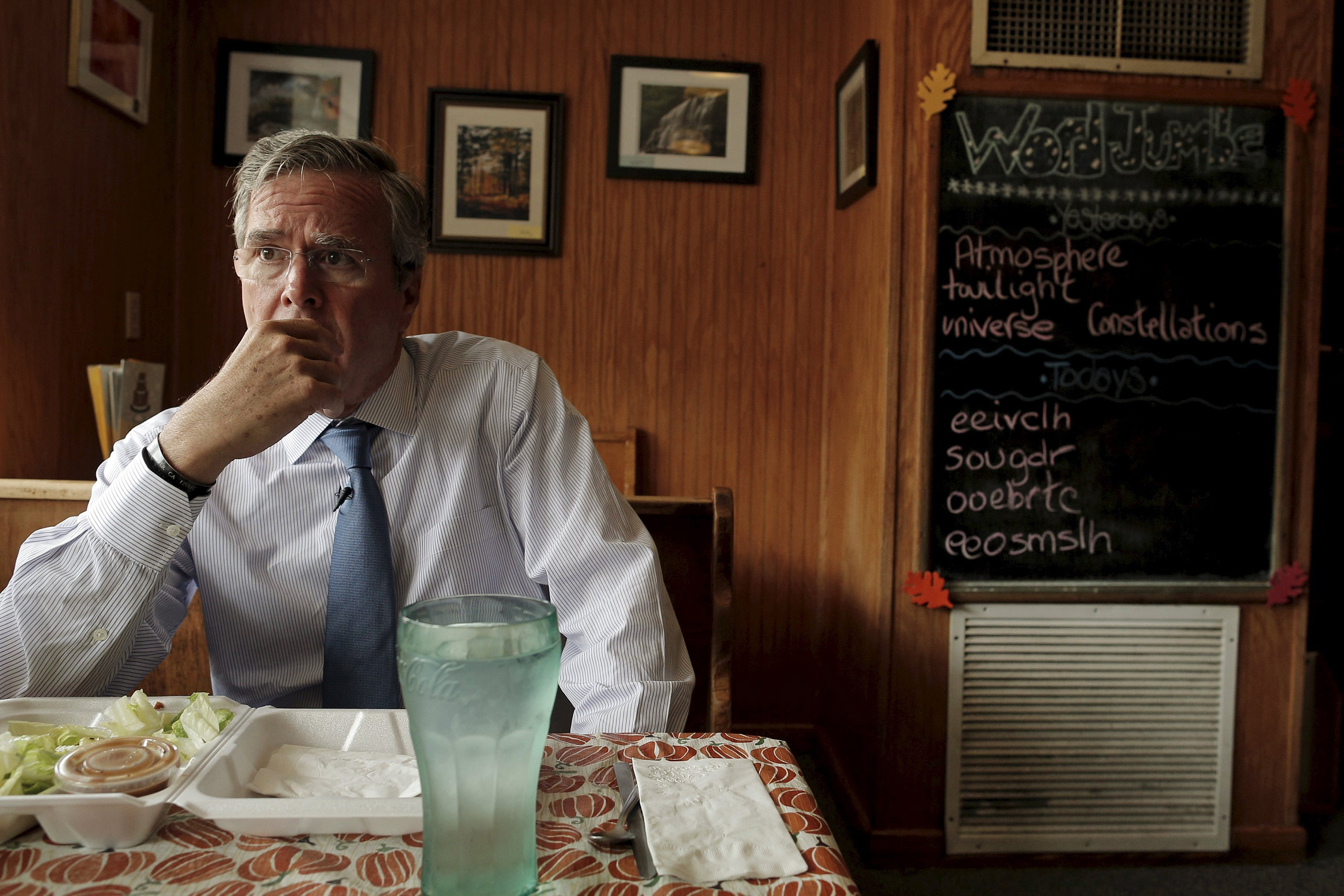 A onetime front runner, Bush campaigns 16-hour days, including a recent stop at a café in Peterborough, N.H. (Brian Snyder—Reuters)