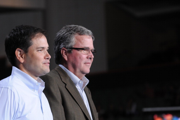 Senator Marco Rubio and Governor Jeb Bush attend Mitt Romney victory campaign Rally at Bank United Center on October 31, 2012 in Miami, Florida.