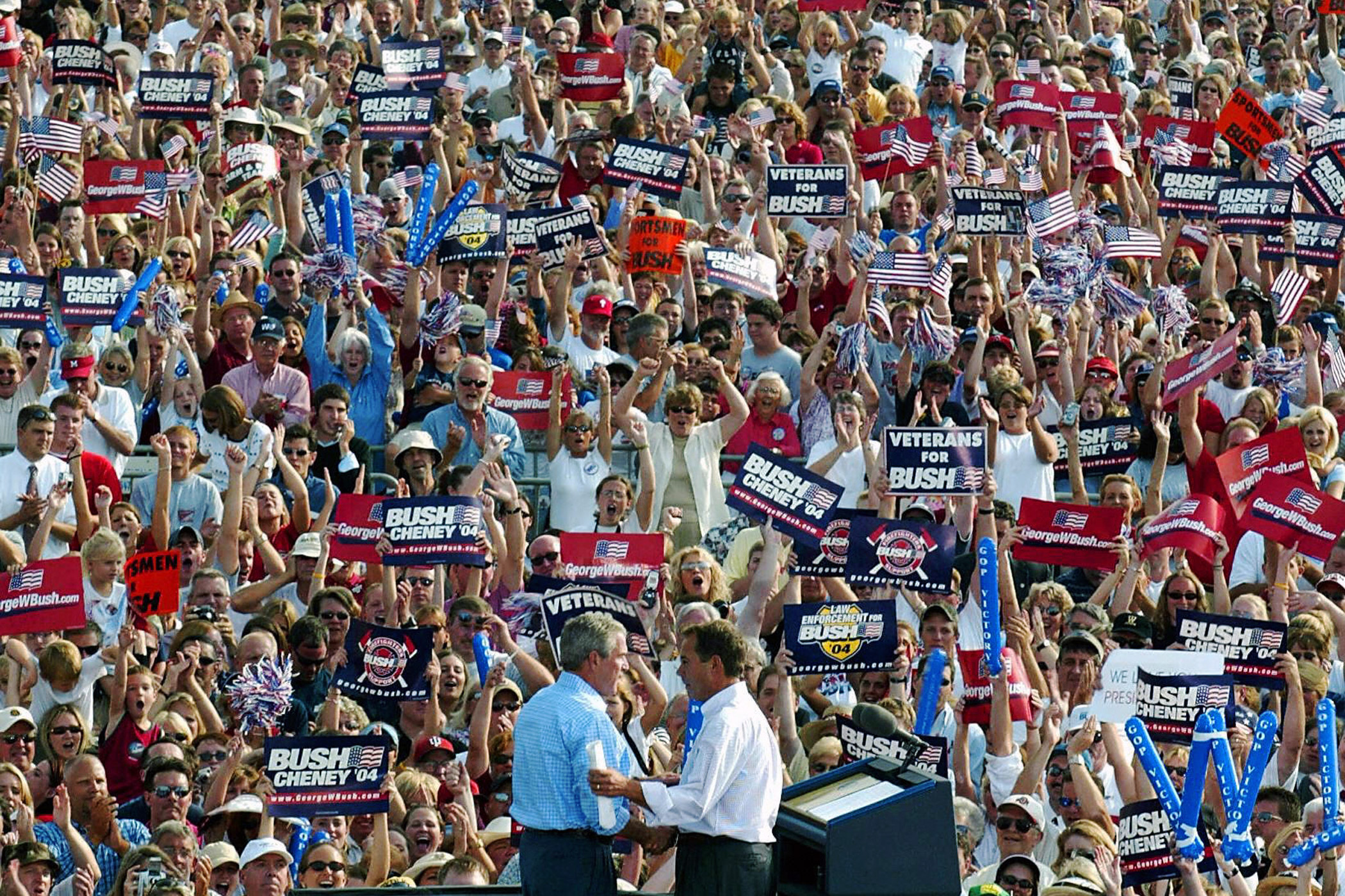 Boehner introduces George W. Bush during a rally in West Chester, Ohio, in 2004.