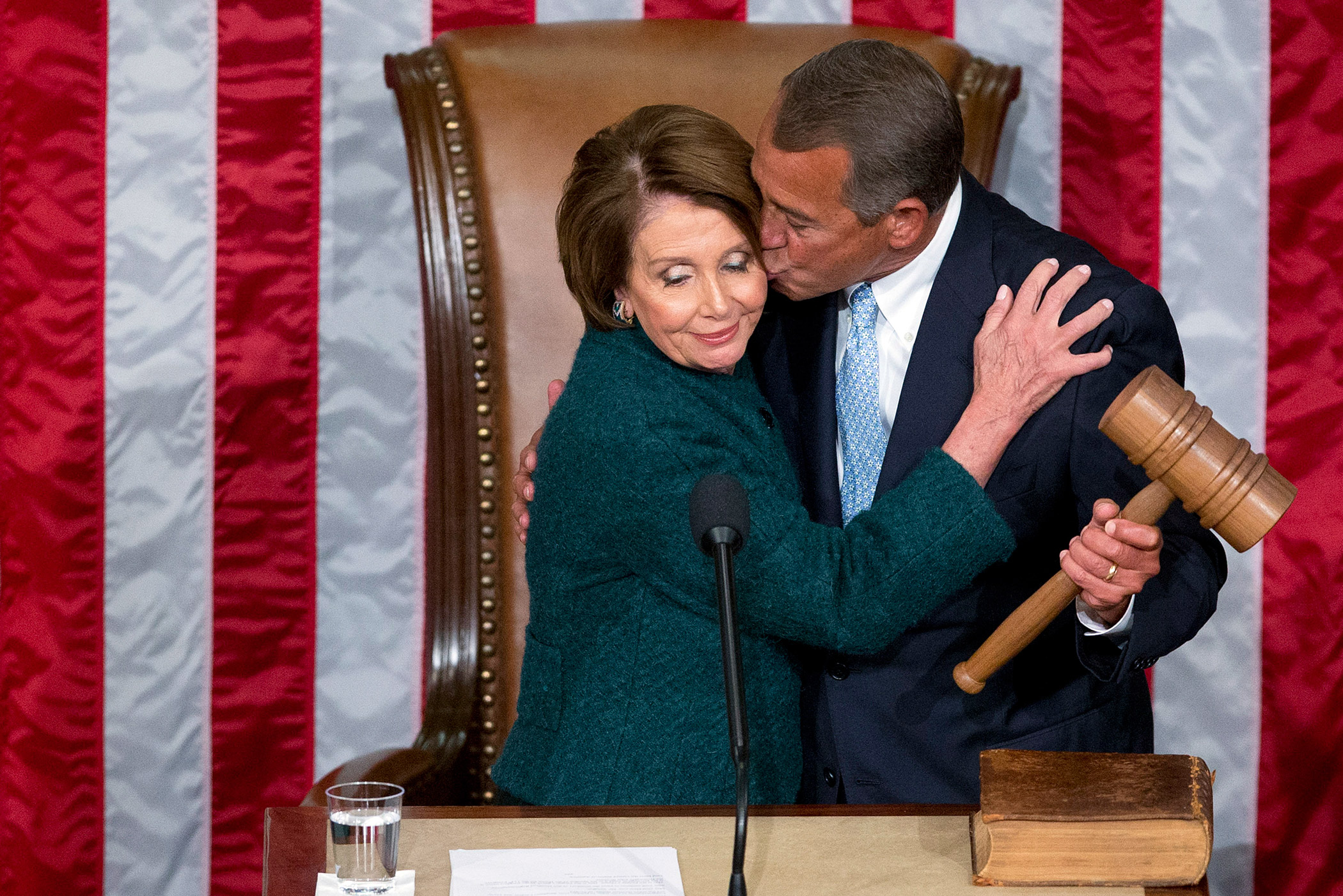 Boehner kisses former Democratic Speaker Nancy Pelosi during the first session of the 114th Congress in the House Chamber at the U.S. Capitol in Washington on Jan. 6, 2015.