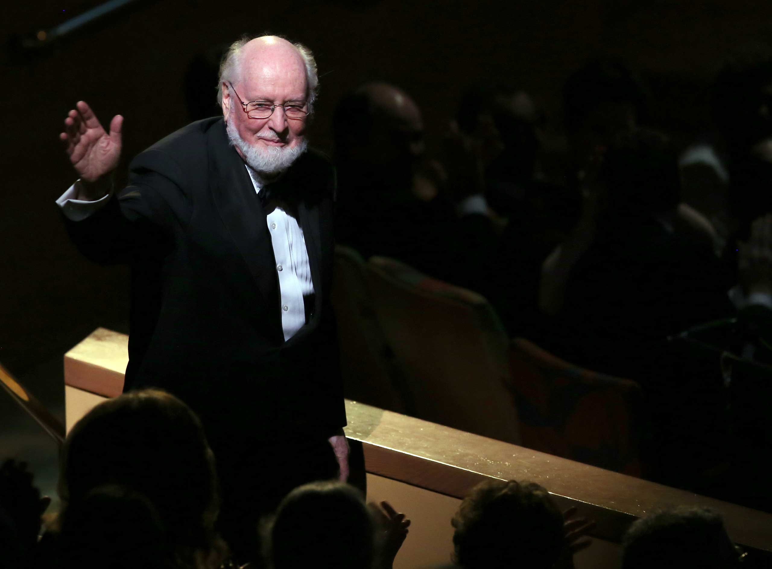 Composer John Williams waves to the audience at Los Angeles Philharmonic's Walt Disney Concert Hall Opening Night Gala  in Los Angeles, on Sept. 30, 2014. (Mathew Imaging—Getty Images)