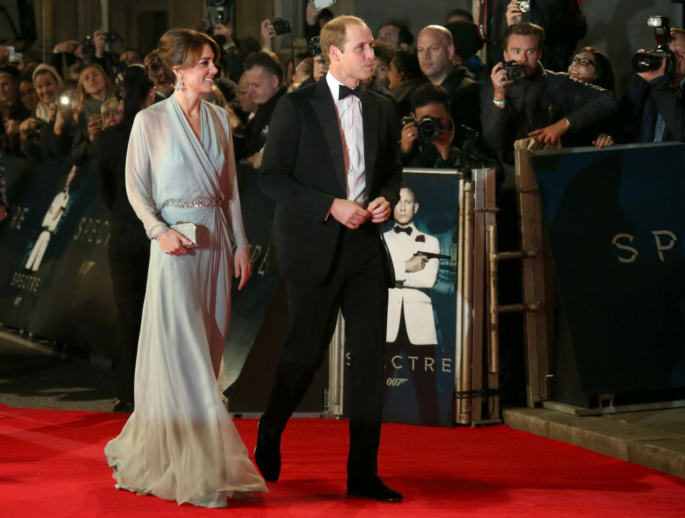 The Duchess of Cambridge, left, and the Duke of Cambridge arrive for the World Premiere of "Spectre" at the Royal Albert Hall in central London, on Monday, Oct. 26, 2015. (Photo by Joel Ryan/Invision/AP)