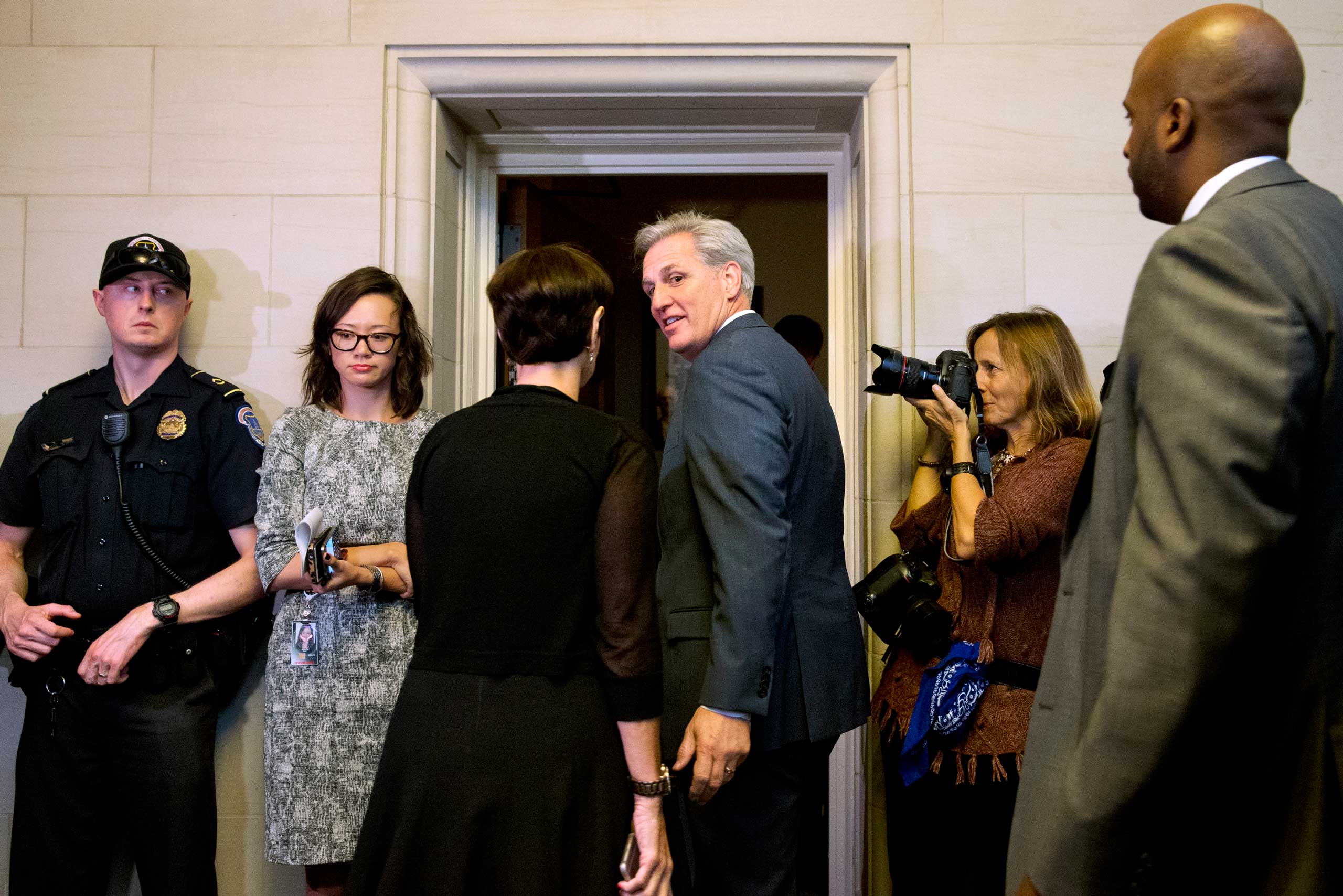 House Majority Leader Kevin McCarthy of Calif., center, turns to his wife Judy McCarthy as they enter a House Republican caucus vote on its nominee to replace House Speaker John Boehner, in Washington D.D., Oct. 8, 2015. (Jacquelyn Martin—AP)