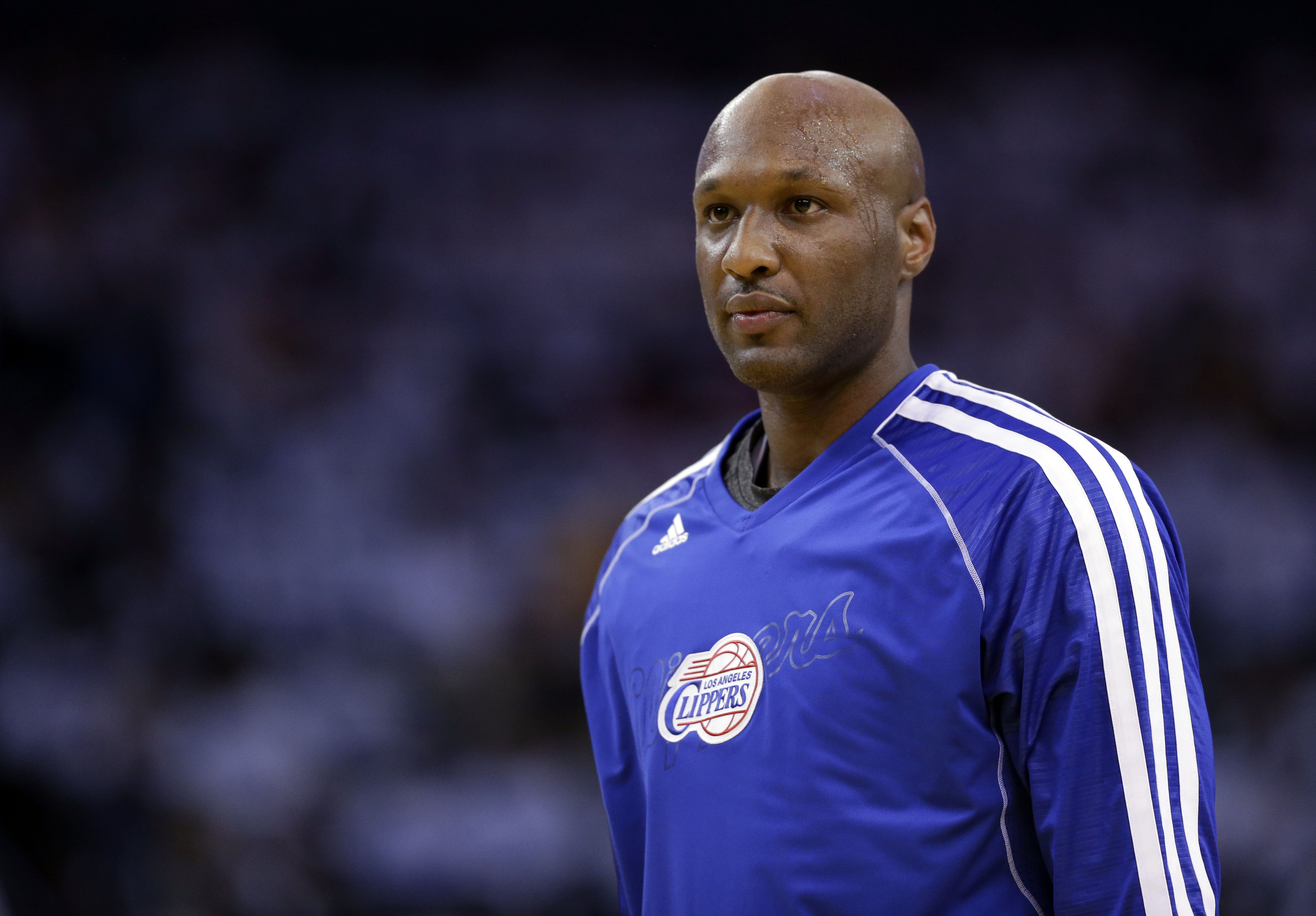 This  file photo shows Los Angeles Clippers' Lamar Odom (7) in action against the Golden State Warriors during an NBA basketball game in Oakland, Calif. on Jan. 2, 2013 (Marcio Jose Sanchez—AP)