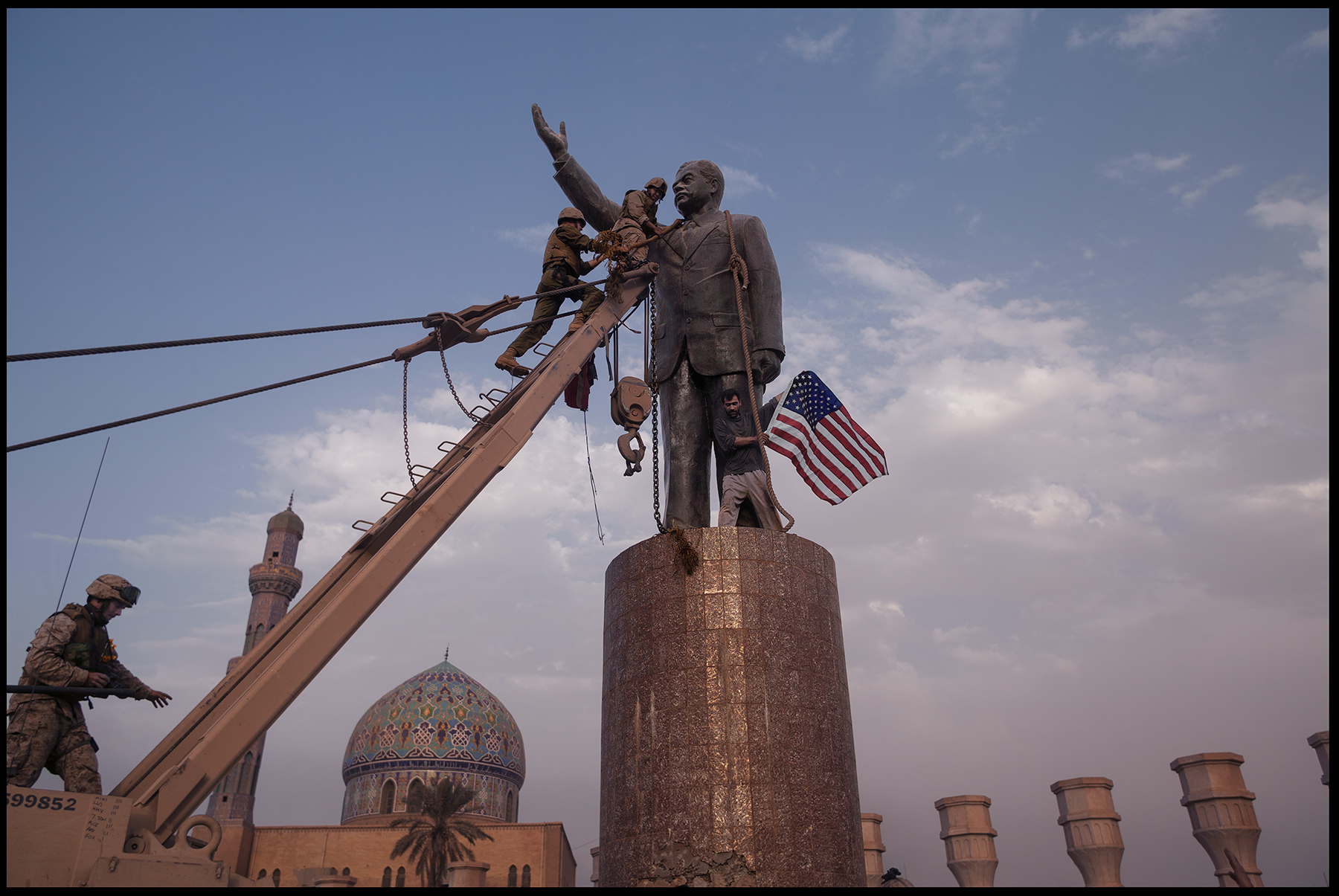 Statue of Iraq’s President Saddam Hussein toppled in Firdos Square, Baghdad, April 9, 2003