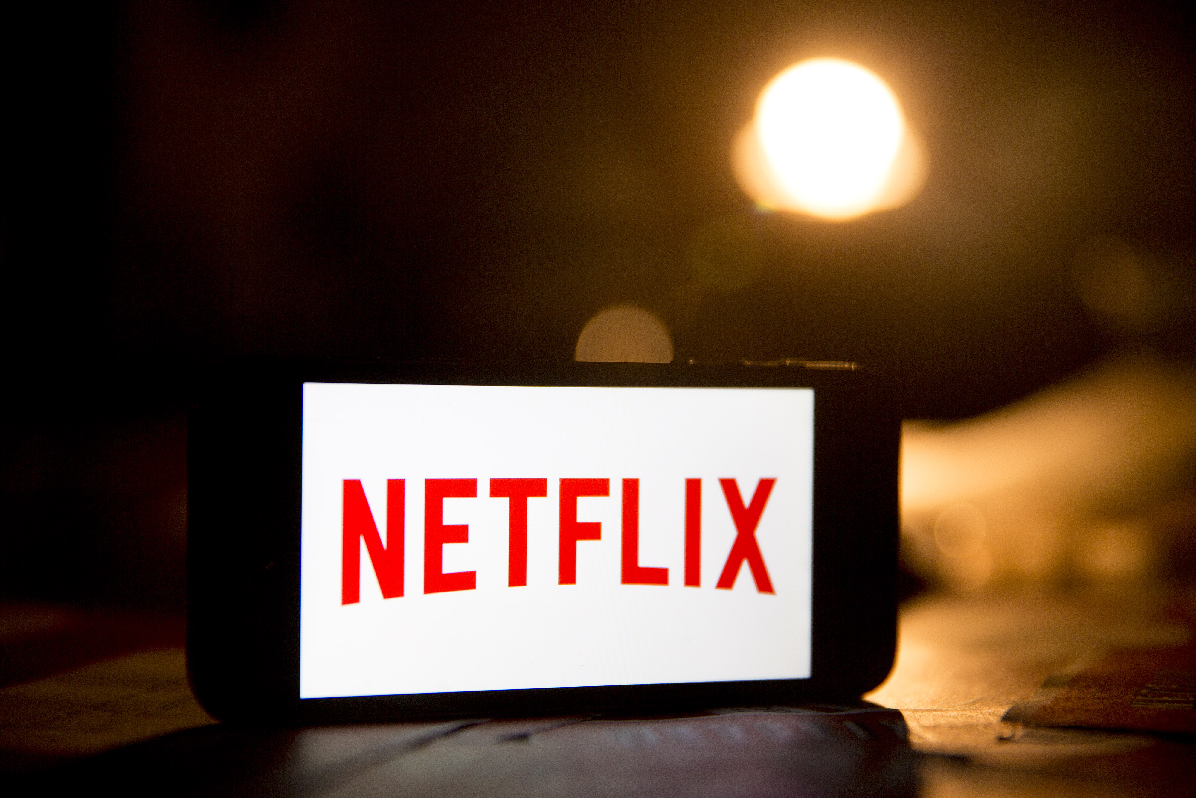 The Netflix Inc. logo is displayed on an iPhone 5s. (Andrew Harrer—Bloomberg via Getty Images)