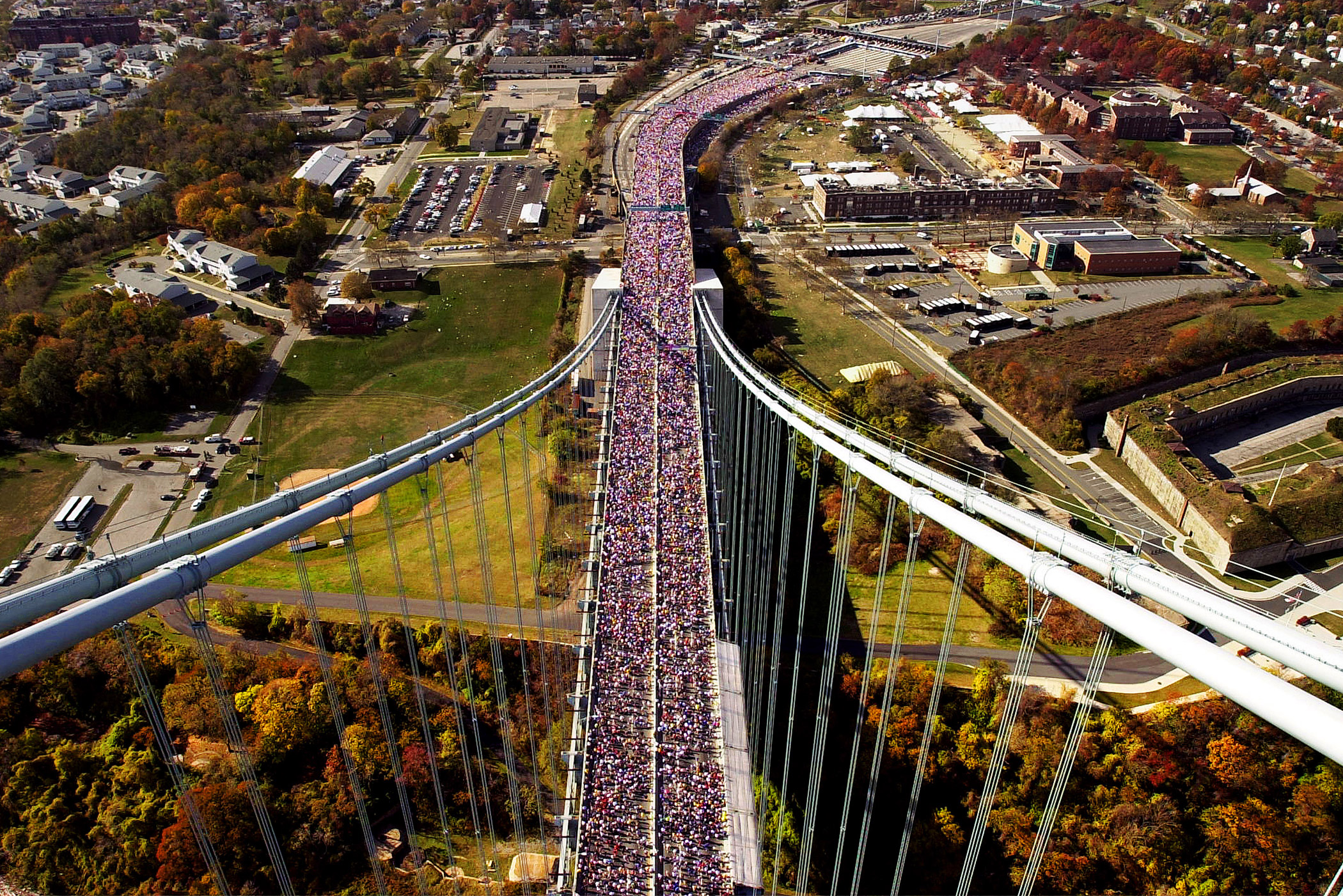 Runners make their way across the Verrazano Narrows Bridge in New York at the start of the New York City Marathon on Nov. 5, 2000.