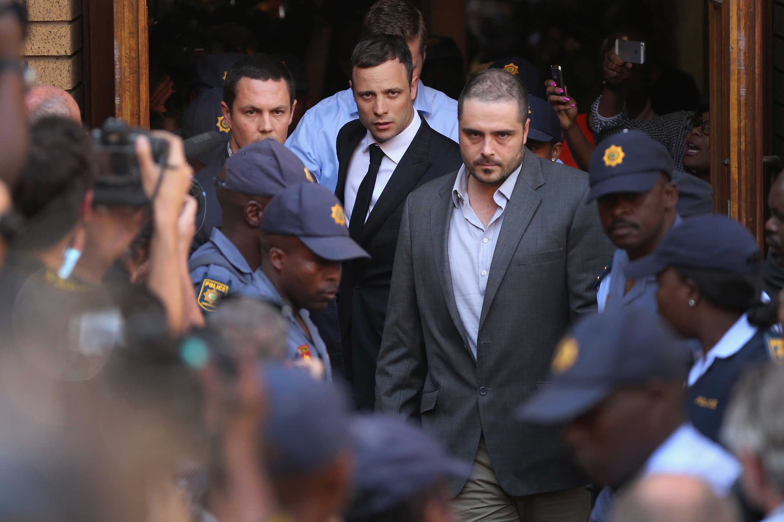 Oscar Pistorius leaves North Gauteng High Court in Pretoria, South Africa, on Sept. 11, 2014. (Christopher Furlong—Getty Images)