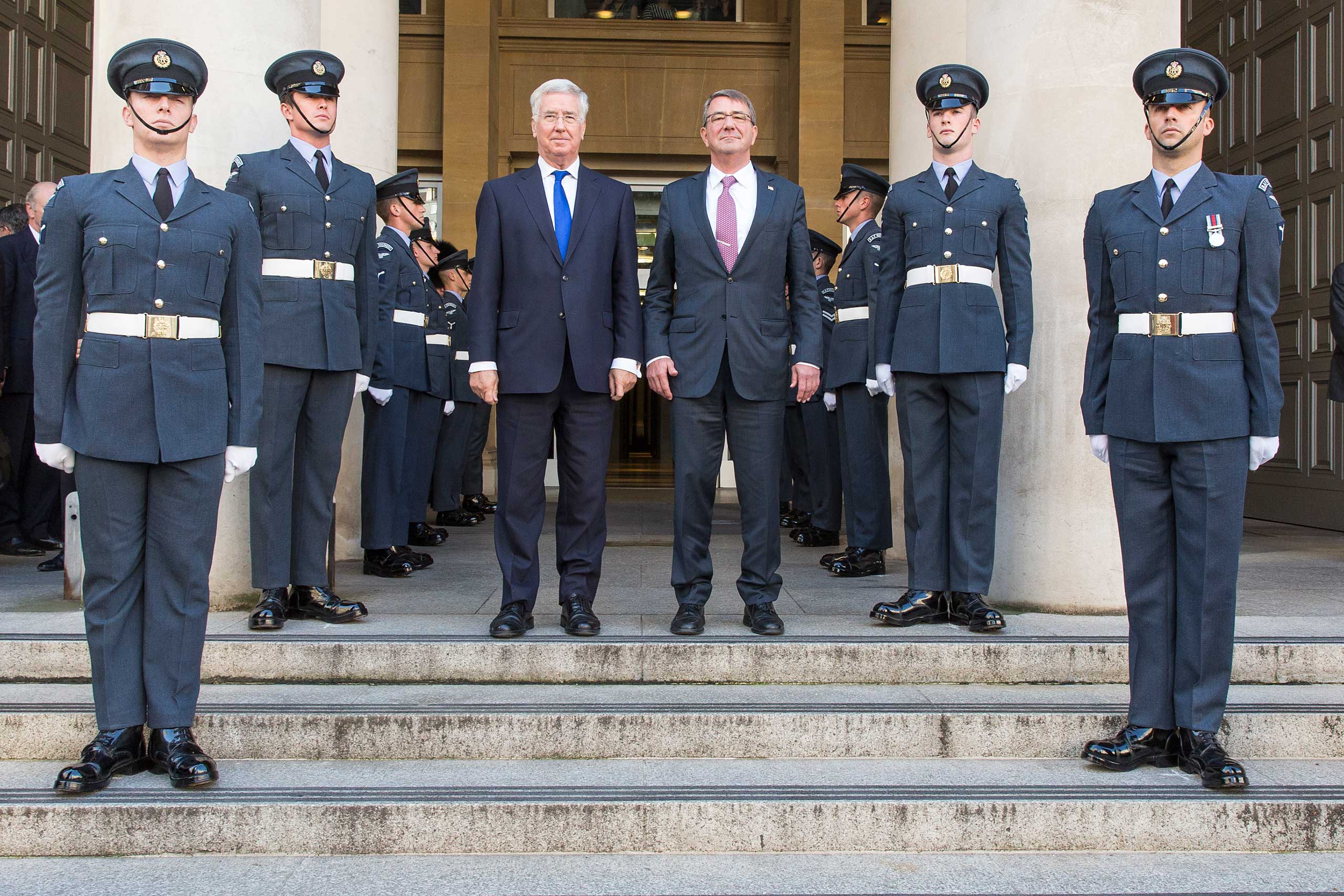 British State Secreatary for Defense Michael Fallon (C-L) and his US counterpart Ashton Carter (C-R) observing an honor guard during their meeting at the Ministry of Defence Main Building in London, Oct. 9, 2015. (Sgt Ross Tilly Raf/Britsih Ministry of Defence—EPA)