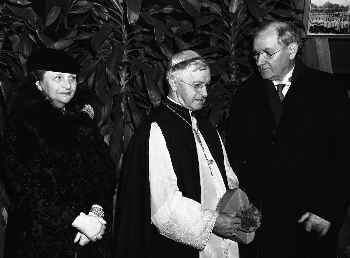 A Red Mass was celebrated Jan. 9, 1939 at the national shrine of the immaculate conception at Catholic University in Washington. Shown with the most Rev. John T. McNicholas, center, archbishop of Cincinnati, who delivered the sermon, are justice Pierce Butler, right, of the Supreme Court, and labor secretary Frances Perkins. (AP)