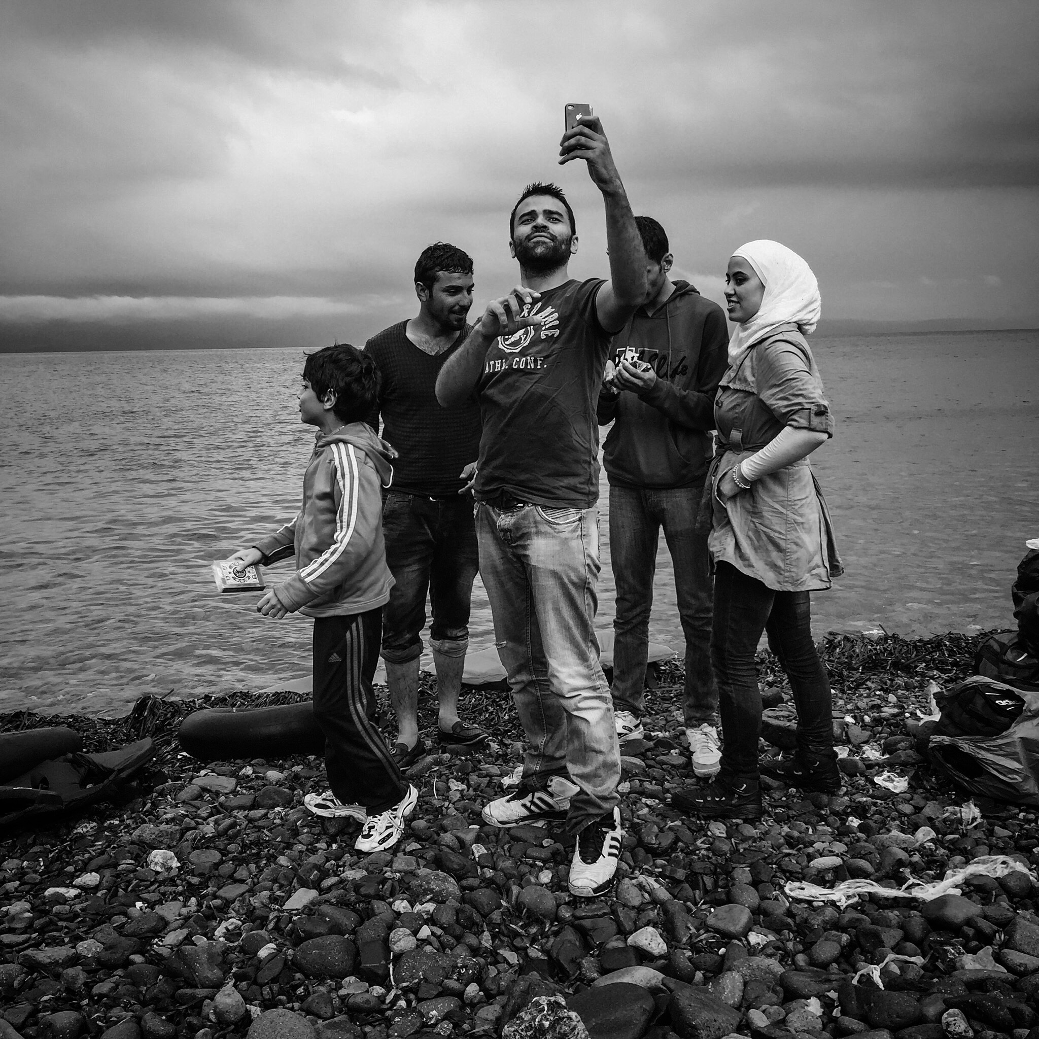 Refugees take a selfie after arriving on the island of Lesbos in Greece.