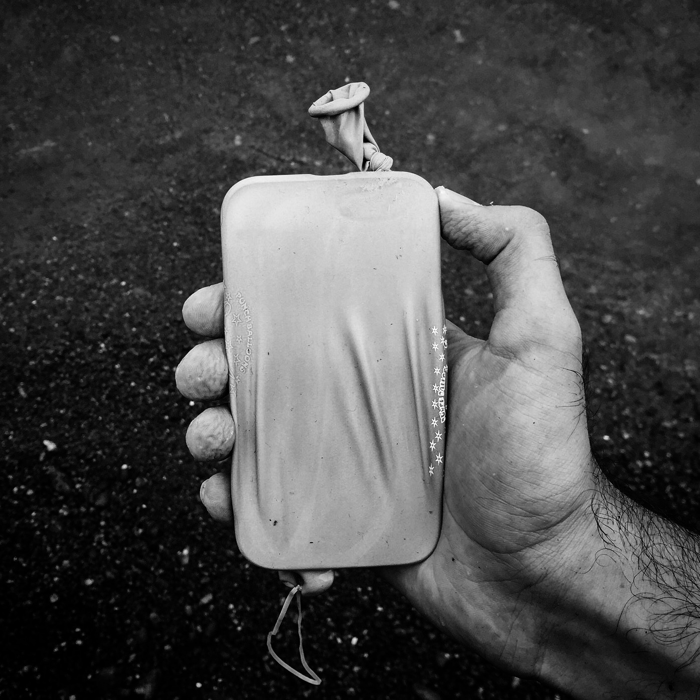 A cellphone protected by plastic. Lesbos, Greece.