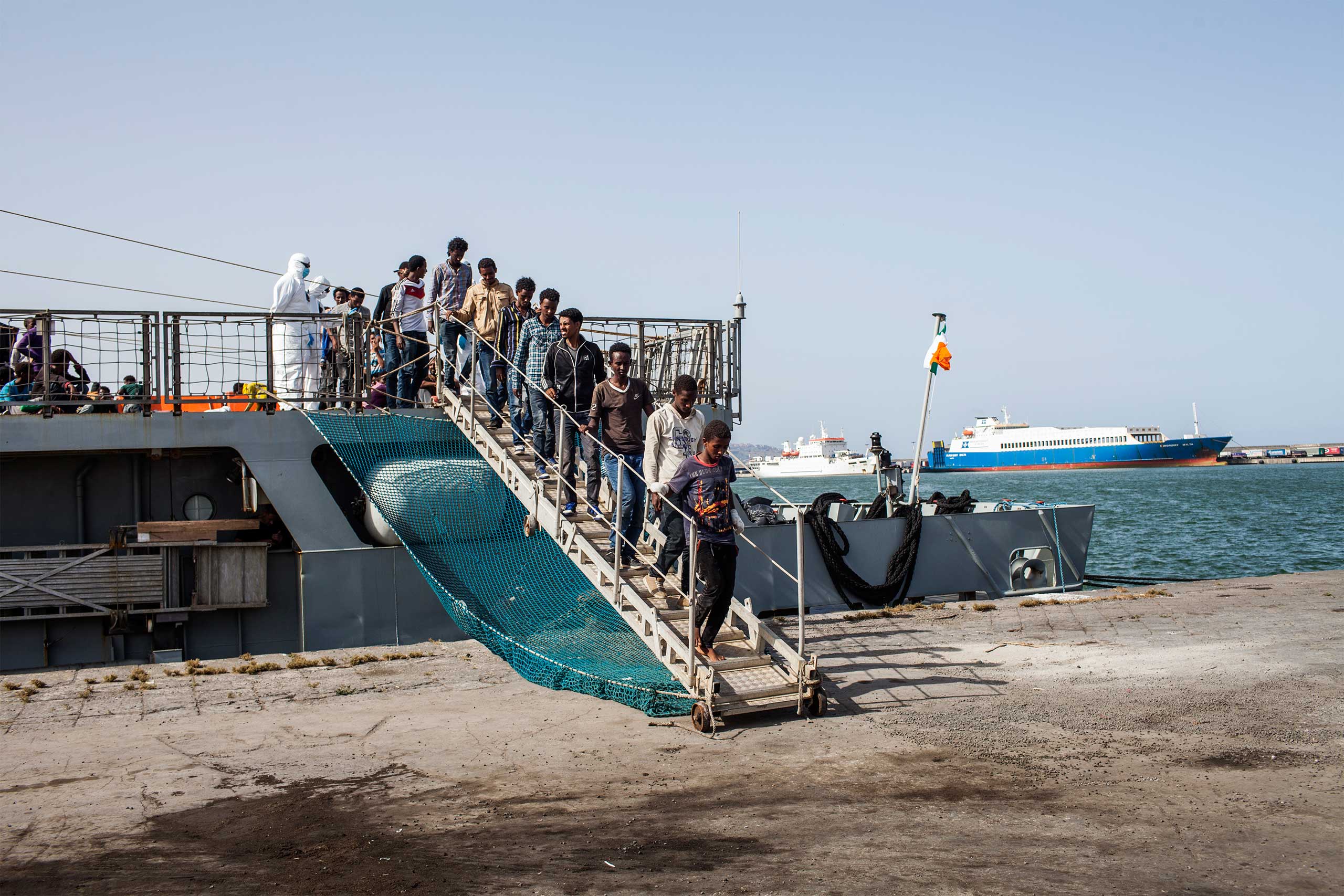 African people, mostly coming from Sudan and Eritrea, land in the Sicilian city of Catania. June 2015.
