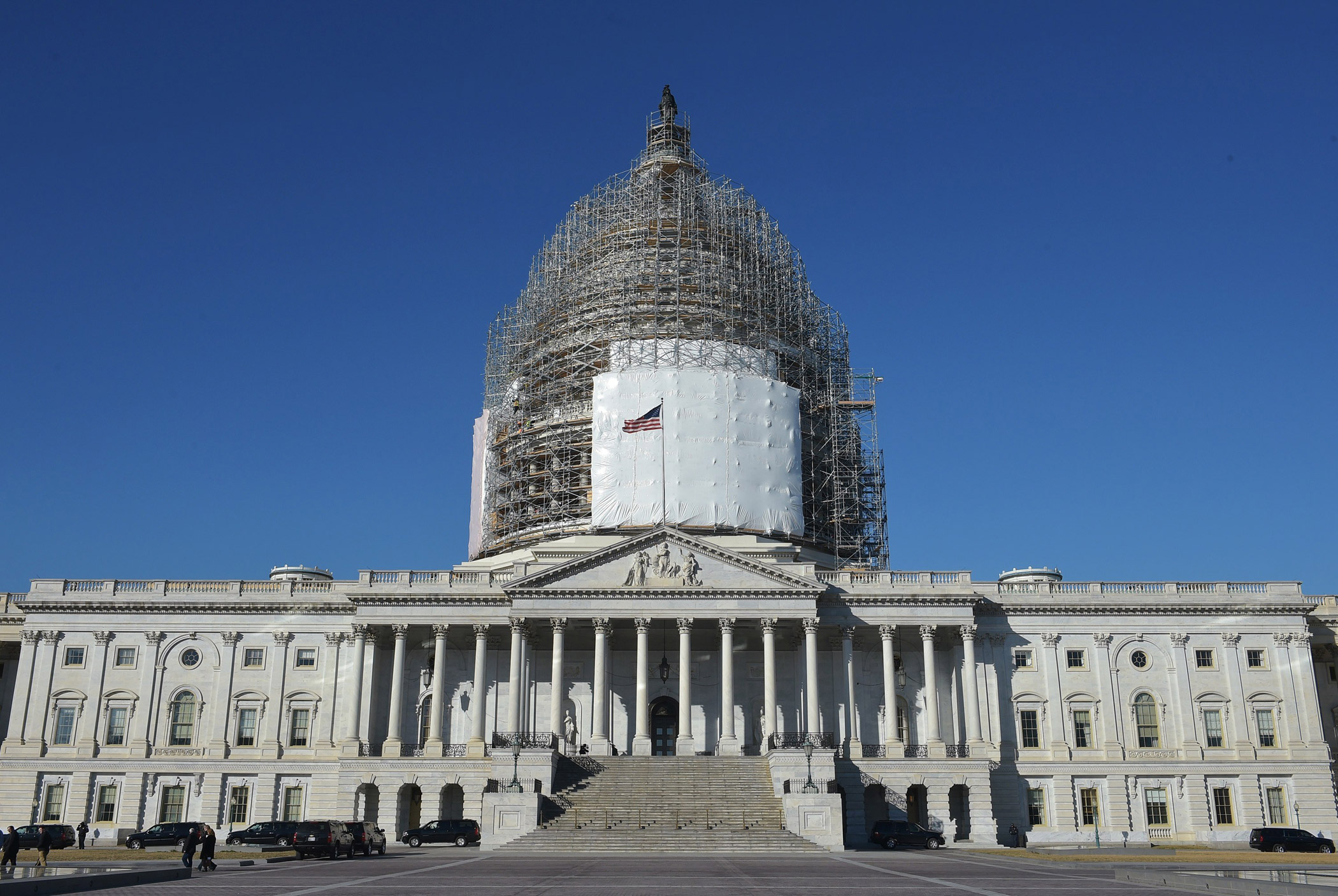 The U.S. Capitol dome, encased in scaffolding, is undergoing renovation in 2015. (MANDEL NGAN&mdash;AFP/Getty Images)