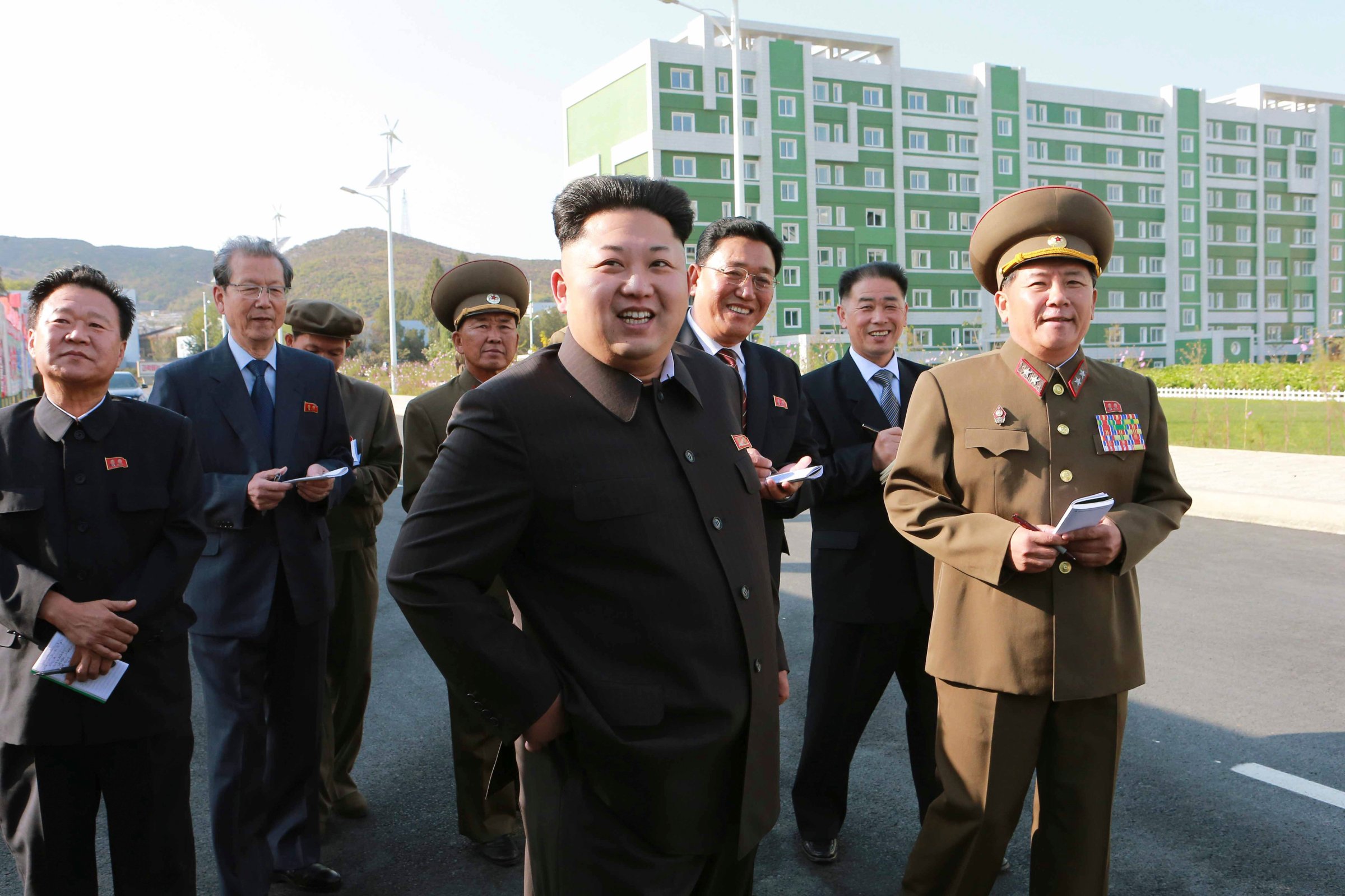 North Korean leader Kim Jong Un gives field guidance at the newly built Wisong Scientists Residential District  in this undated photo released by KCNA