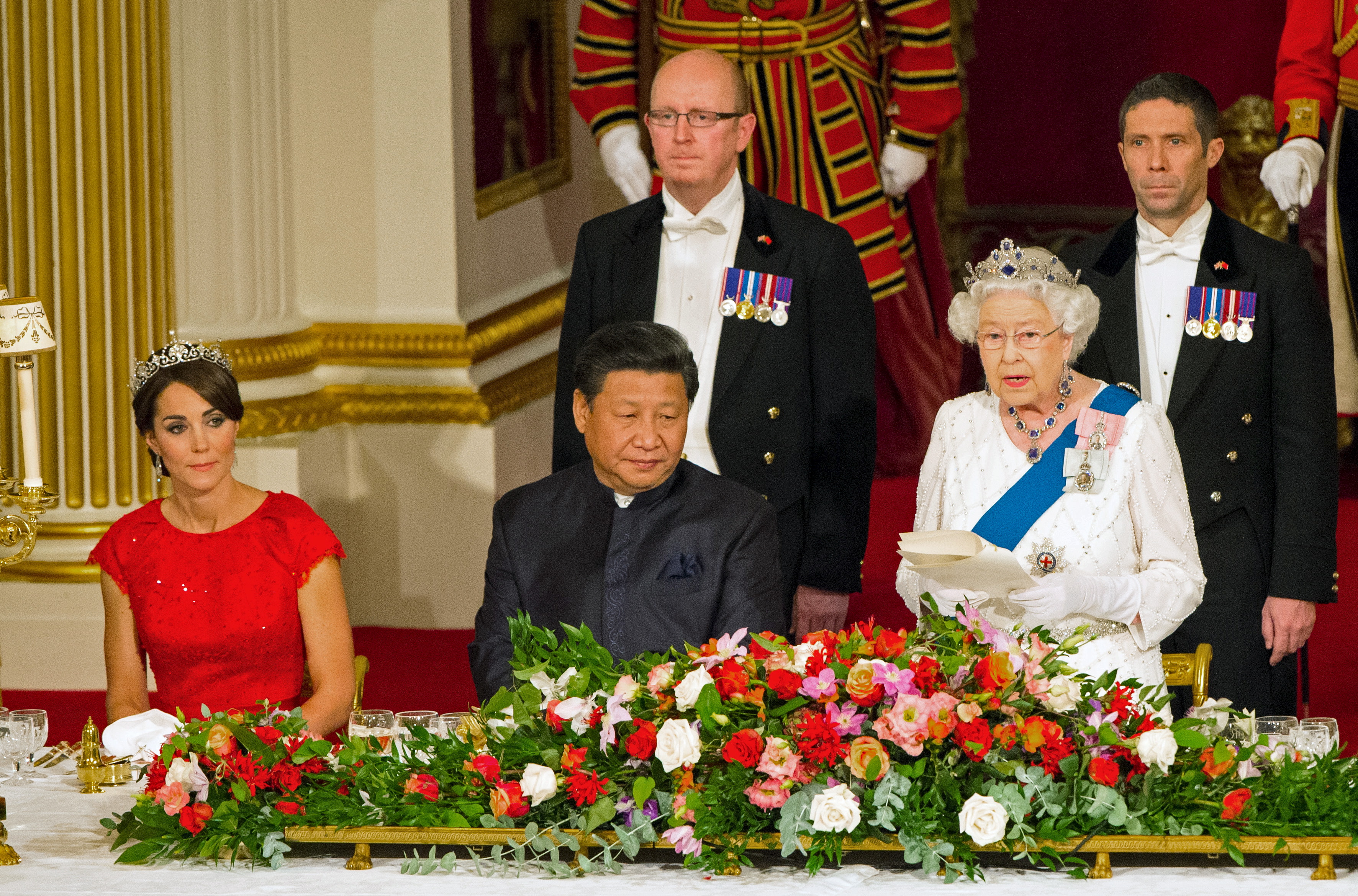 The Duchess of Cambridge and Chinese President Xi Jinping listen as Queen Elizabeth II speaks at a state banquet at Buckingham Palace, London, during the first day of his state visit to Britain