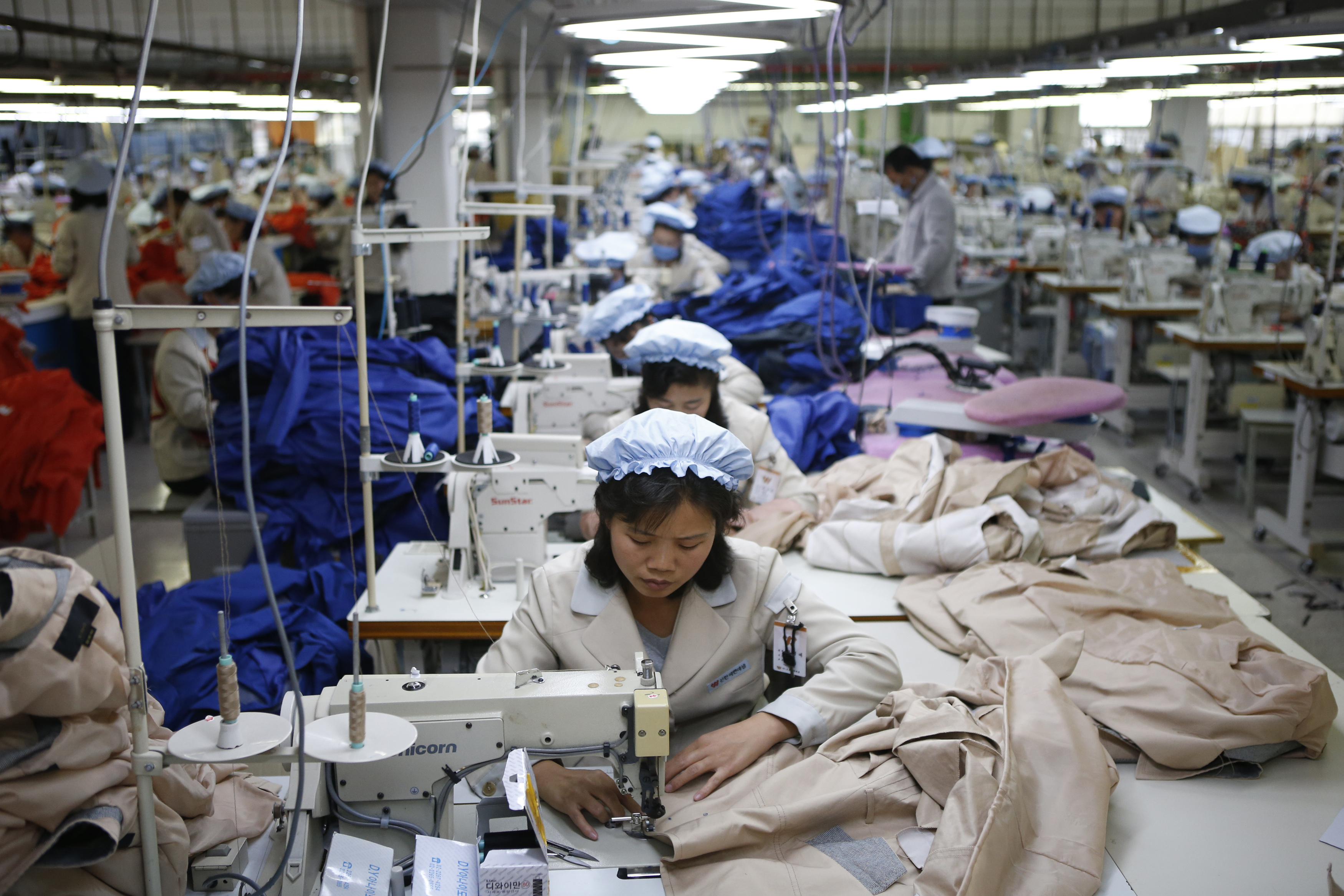 North Korean employees work in a factory of a South Korean company at the Joint Industrial Park in Kaesong industrial zone