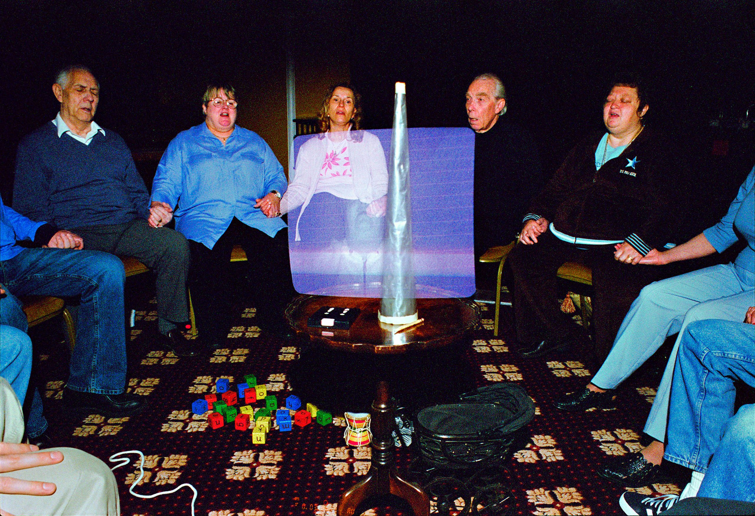 Asking the child spirits to move the toys, physical mediumship class, Stansted, England, 2003.