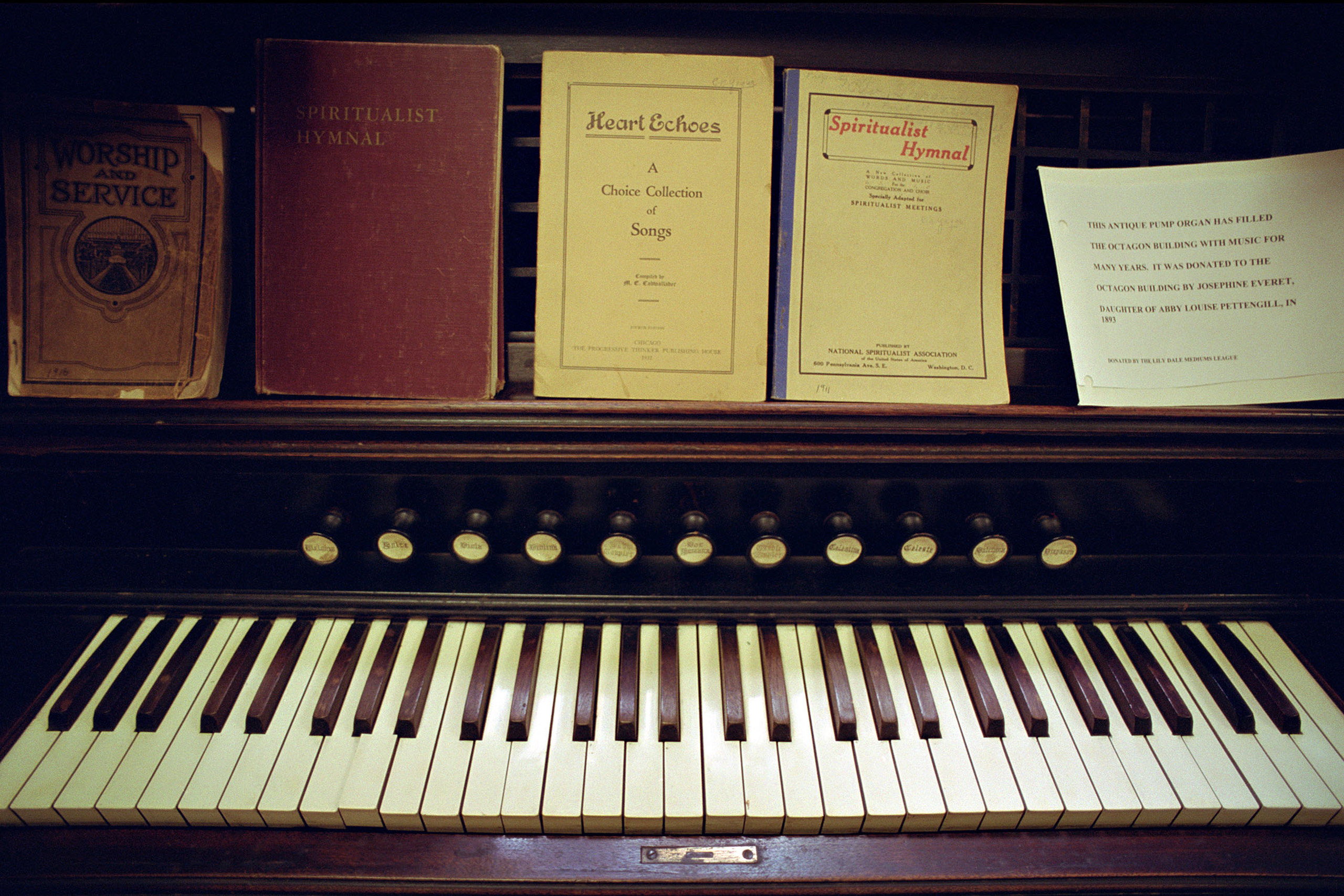 Antique organ with Spiritualist songbooks, Lily Dale Museum, Lily Dale, New York, 2001.