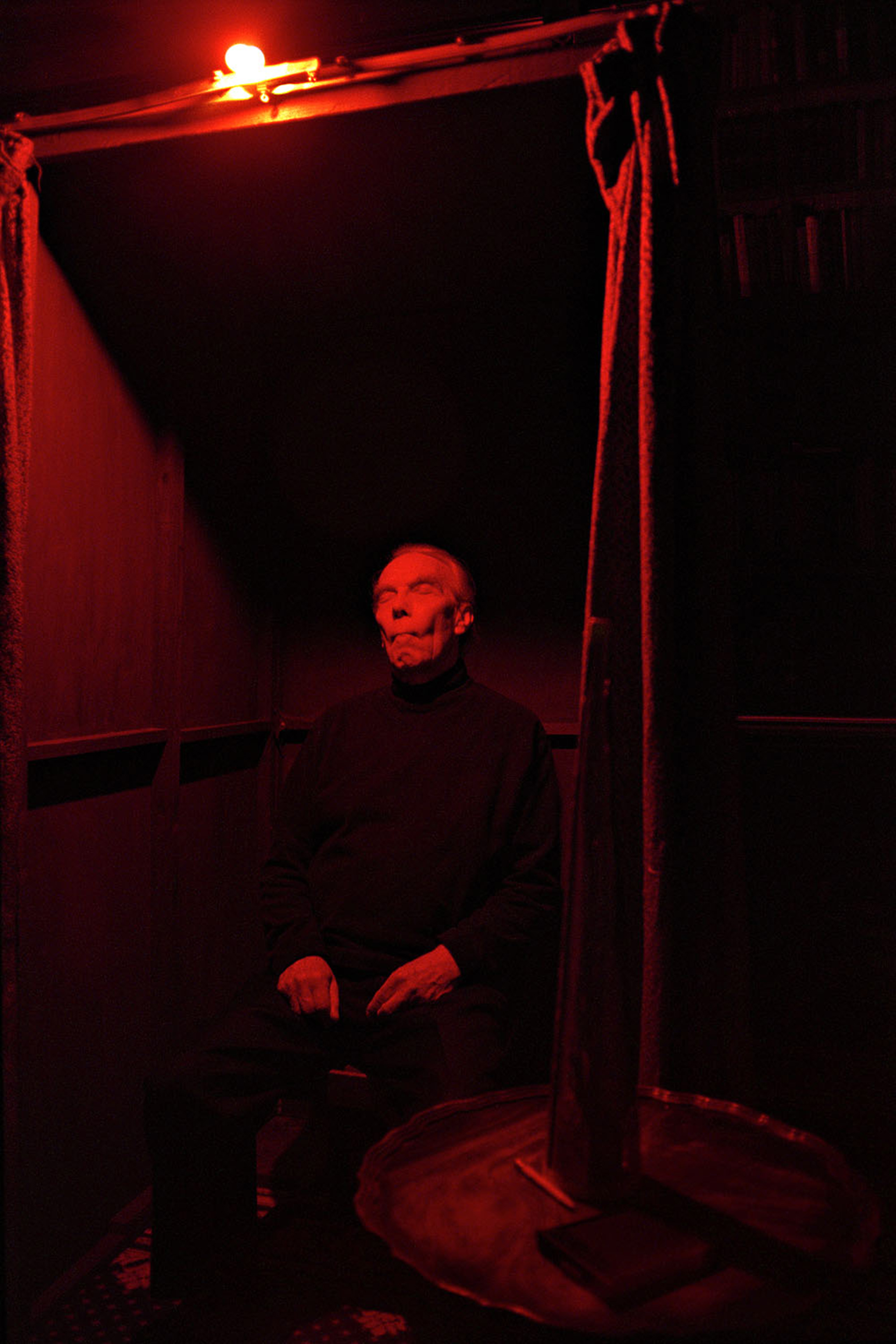 Brian in the medium's cabinet, Arthur Findlay College, Stansted, England, 2003.