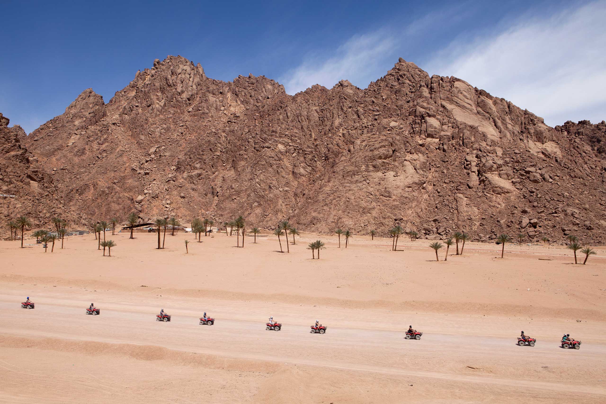 A group on quad bikes on an expedition in the desert, in Sharm el Sheikh, Sinai,  March 2015.