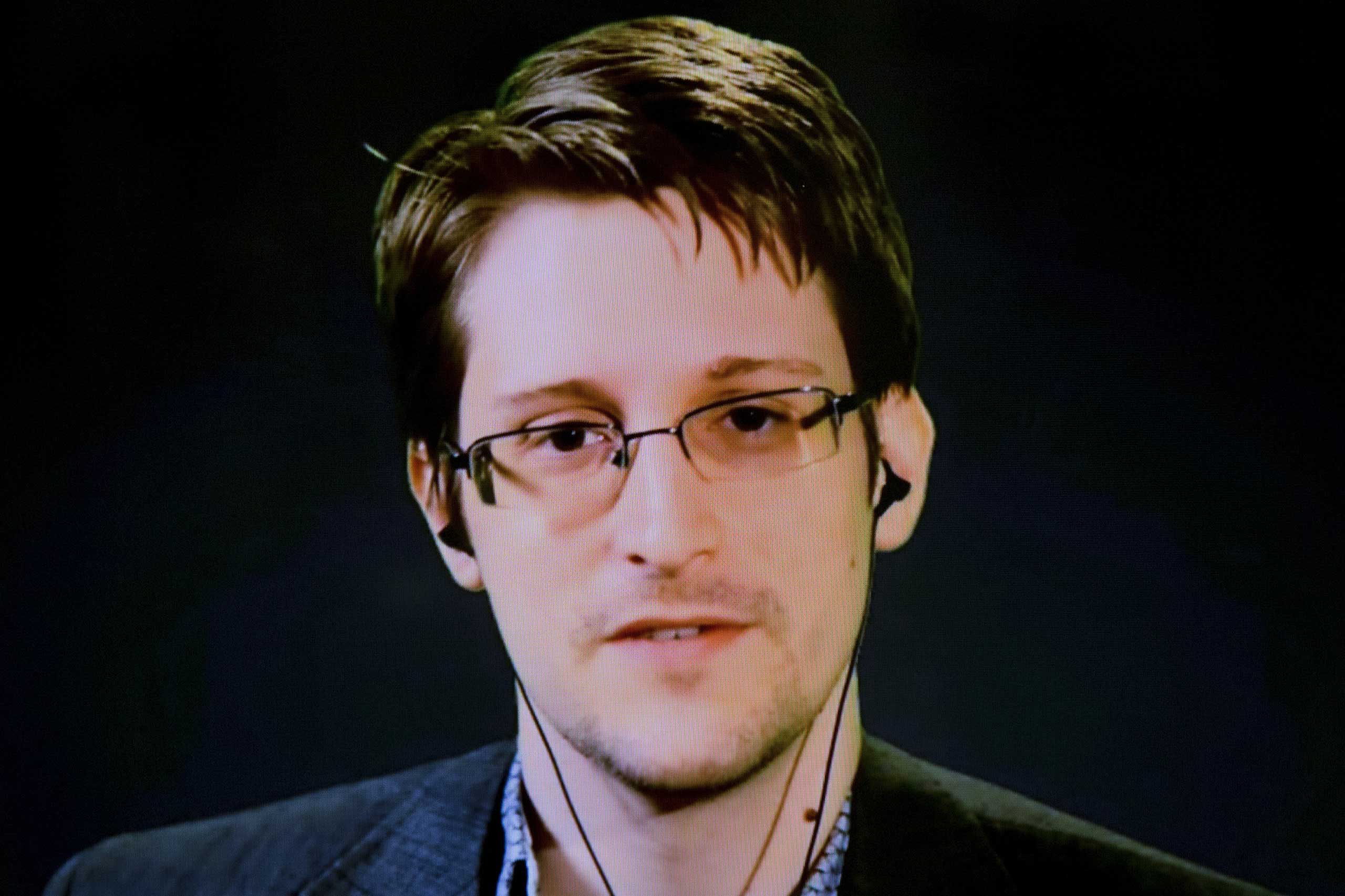 American whistleblower Edward Snowden delivers remarks via video link from Moscow to attendees at a discussion regarding an International Treaty on the Right to Privacy, Protection Against Improper Surveillance and Protection of Whistleblowers in Manhattan, on Sept. 24, 2015. (Andrew Kelly—Reuters)