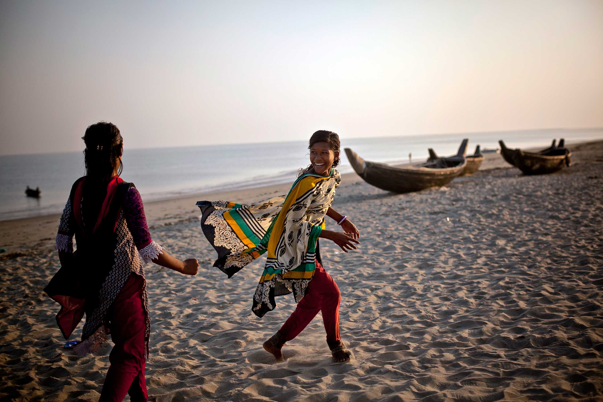 Rifa and Suma dance on the beach, Jan. 2015.