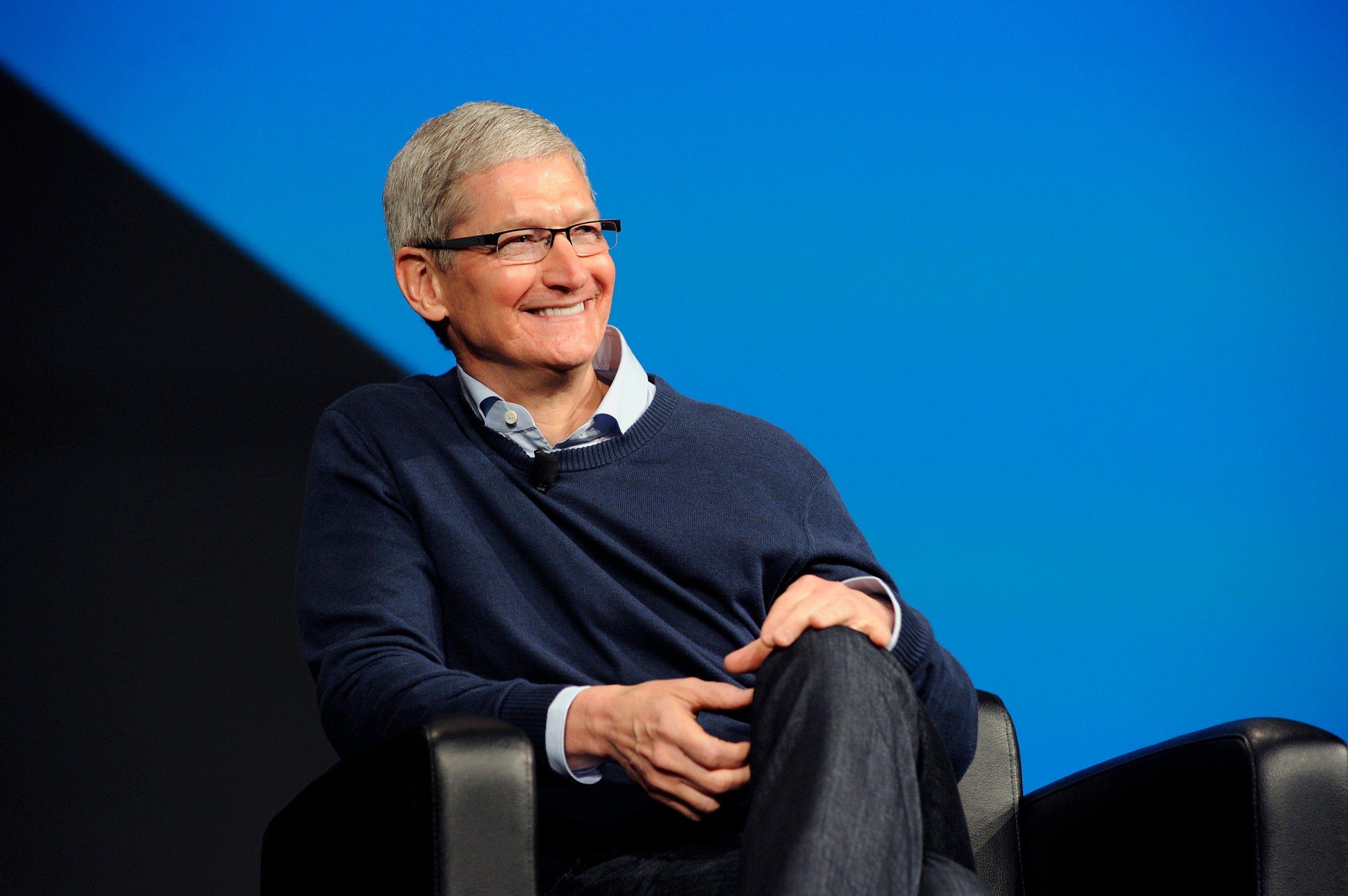 Tim Cook, CEO of Apple, sits on stage during Boxworks 2015 at the Moscone Center in San Francisco, California, U.S., on Tuesday, September 29, 2015. Photographer: Michael Short/Bloomberg