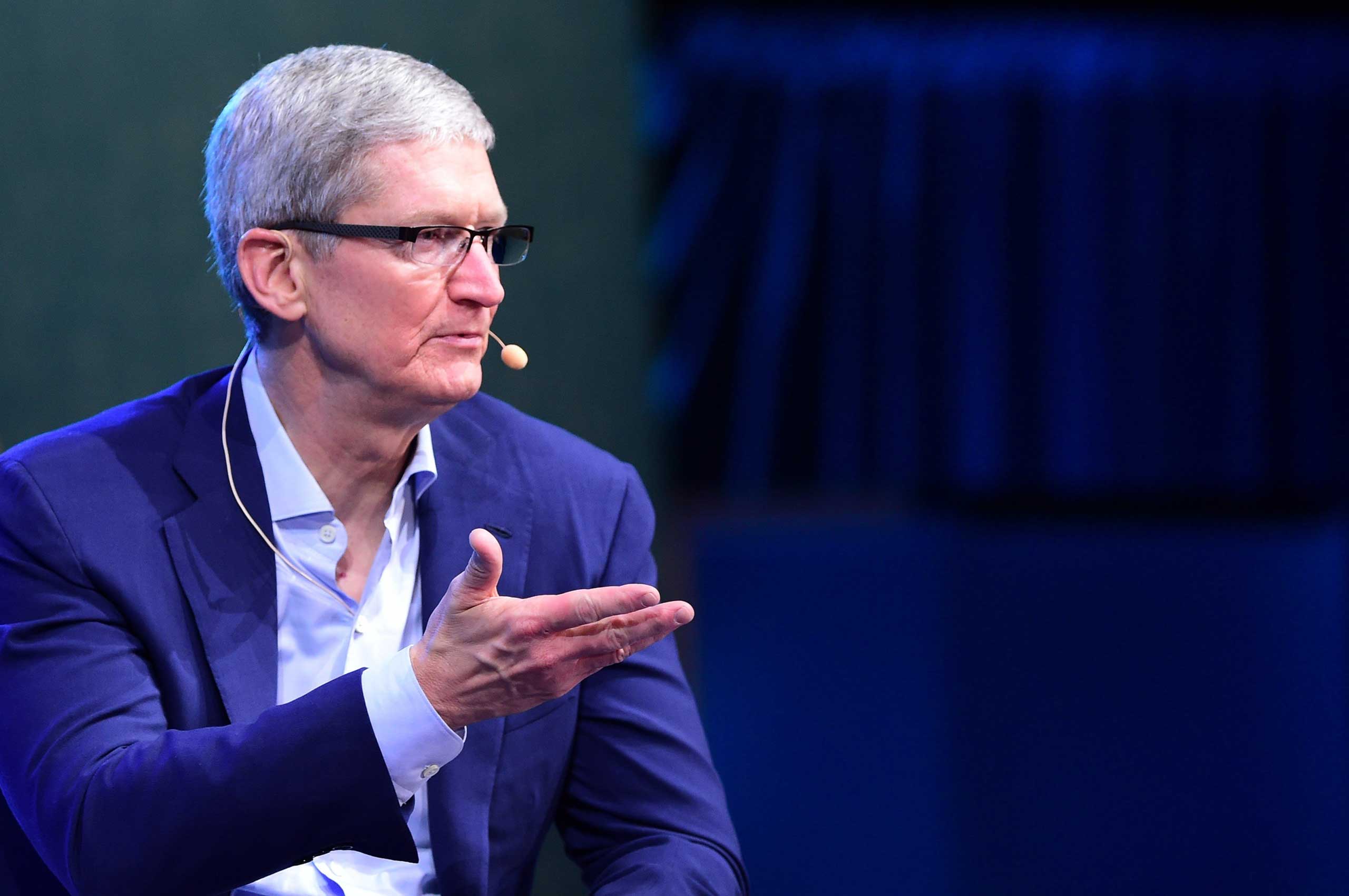 Tim Cook, CEO of Apple, gestures while responding to questions in Laguna Beach, California at the opening of the 2015 WSJD Live, on Oct. 19, 2015. (Frederic J. Brown—AFP/Getty Images)