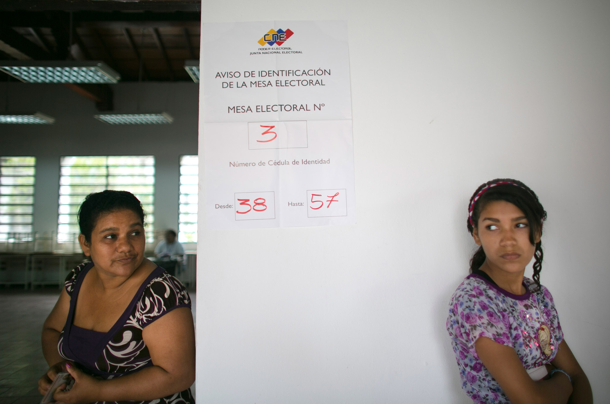 Voters wait to vote at a poll station during ruling party primary elections in Caracas, Venezuela, on June 28, 2015. (Ariana Cubillos—AP)