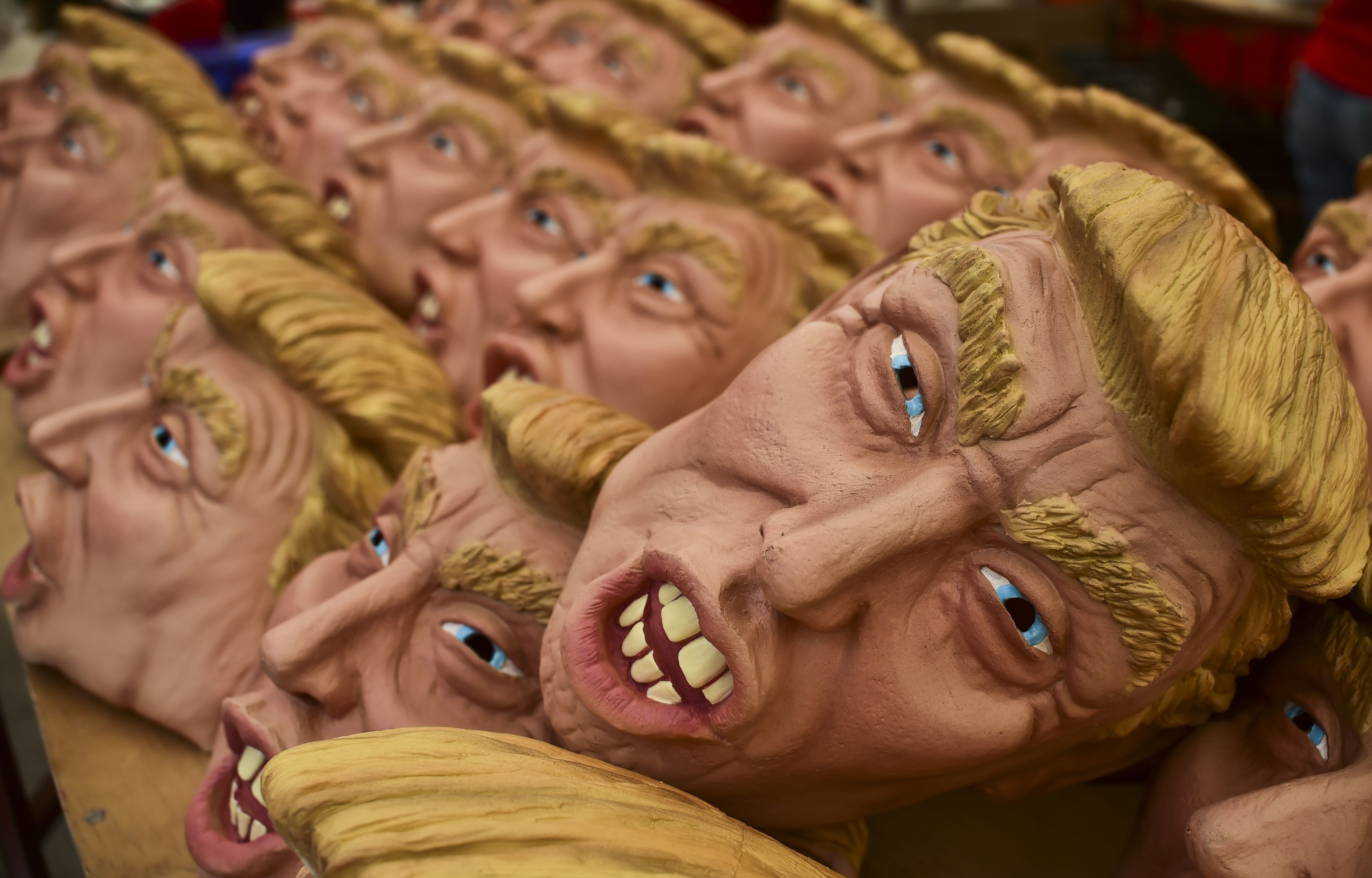 Masks representing Republican presidential candidate Donald Trump are pictured in a factory of costumes and masks, on Oct. 16, 2015, in Jiutepec, Morelos State.