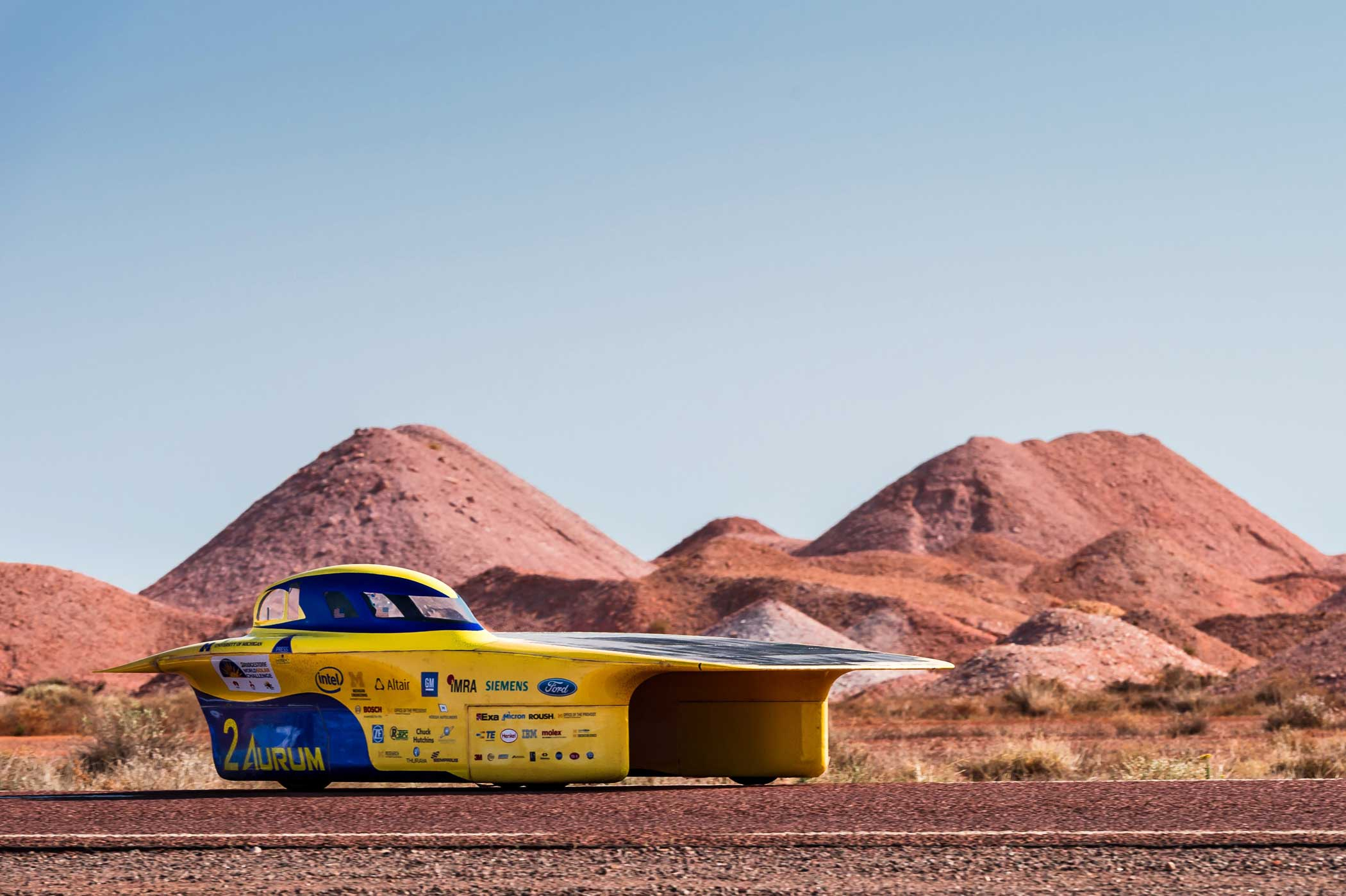 The University of Michigan Solar Car Team car competes during the fourth day of the 2015 World Solar Challenge in Coober Pedy, Australia, on Oct. 21, 2015.