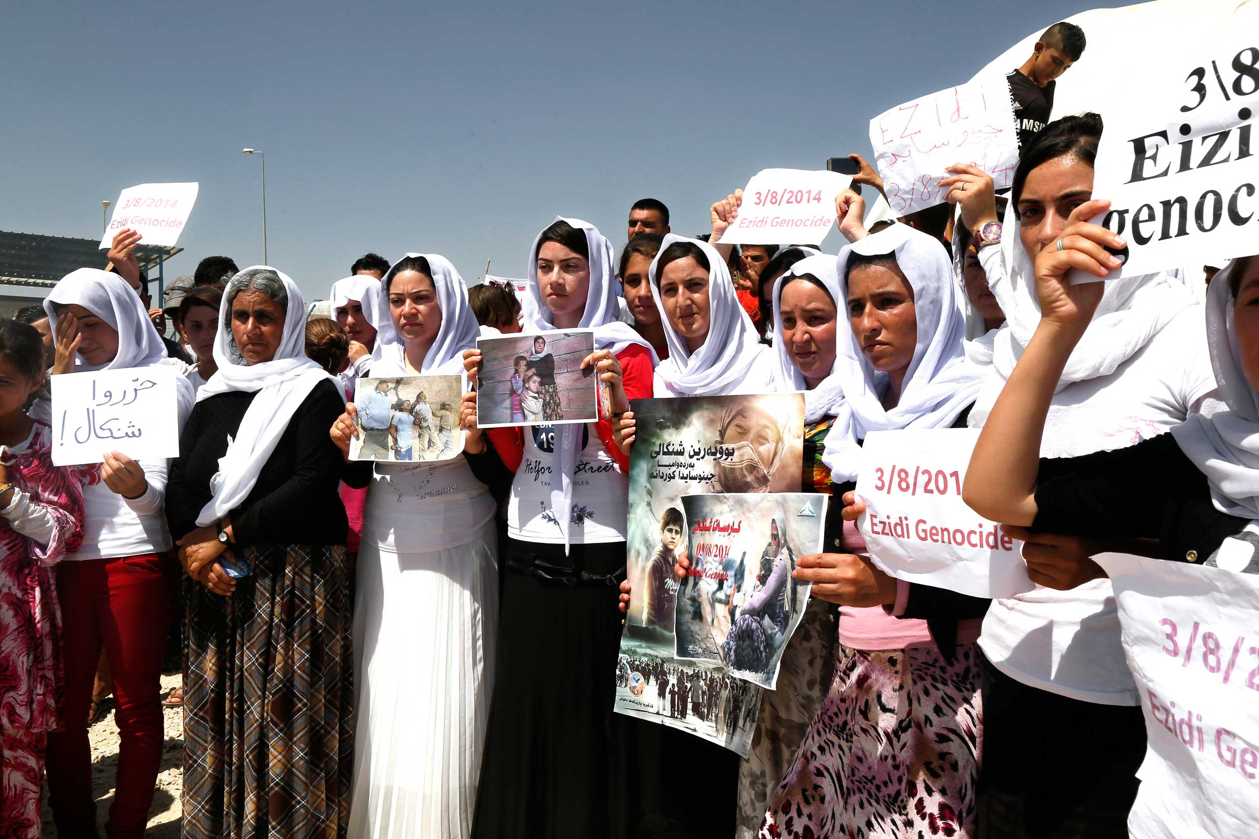 Yezidi women protest against ISIS in Dohuk, northern Iraq, on Aug. 3, 2015. (Seivan M.Salim—AP)