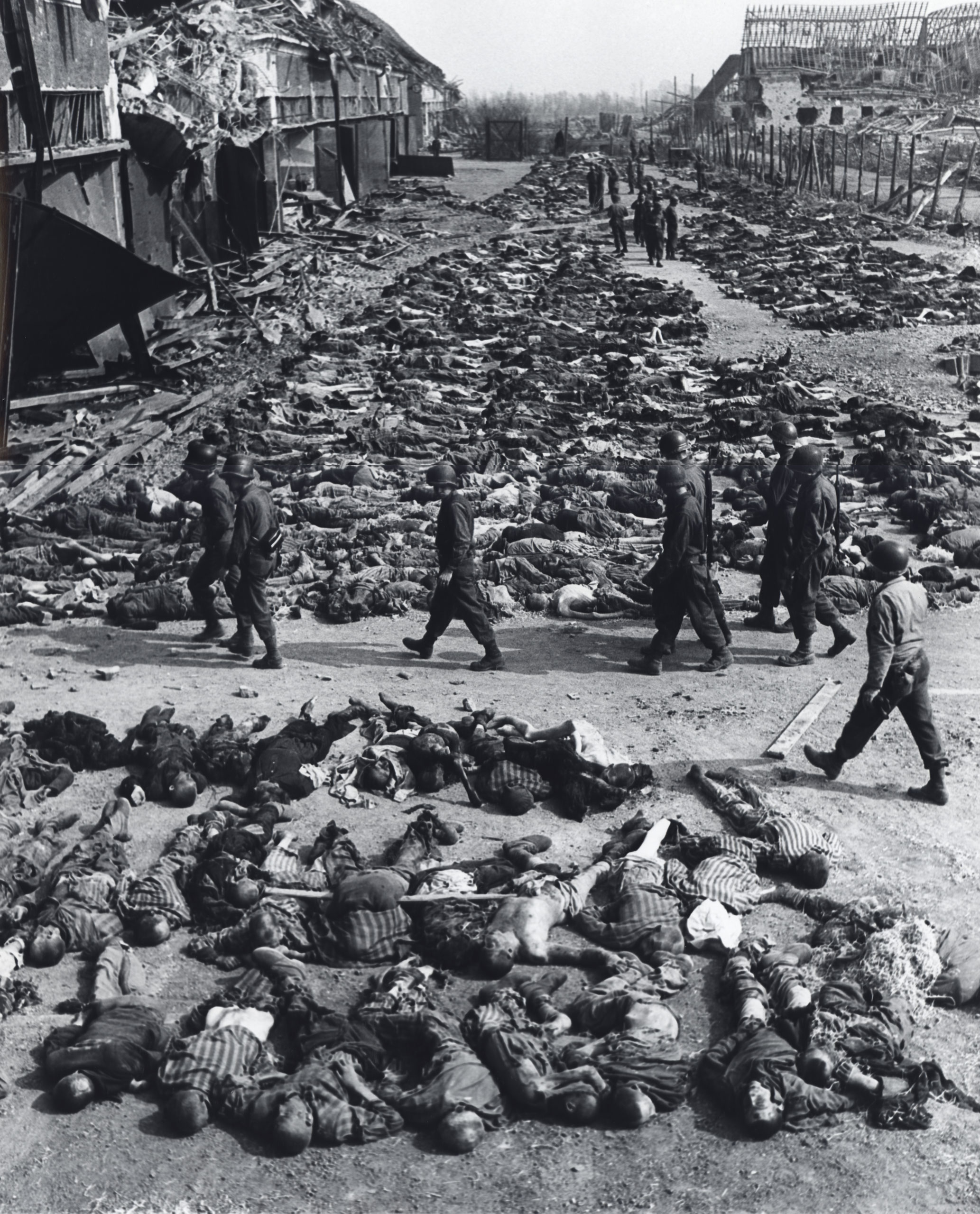 The Bodies of Almost 3,000 Slave Laborers Are Laid Out Along a Bombed Street before Burial by U.S. troops, Nordhausen, Germany, April 12, 1945