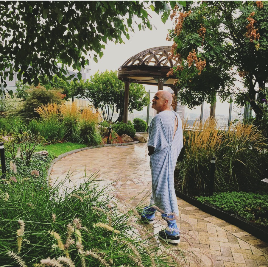 Hours before a second brain surgery in a single week, Andrew Deziel (the author’s father) finds solace in the Healing Garden at the Smilow Cancer Hospital at Yale New Haven Hospital on Sept. 10, 2015. (Melanie Deziel)