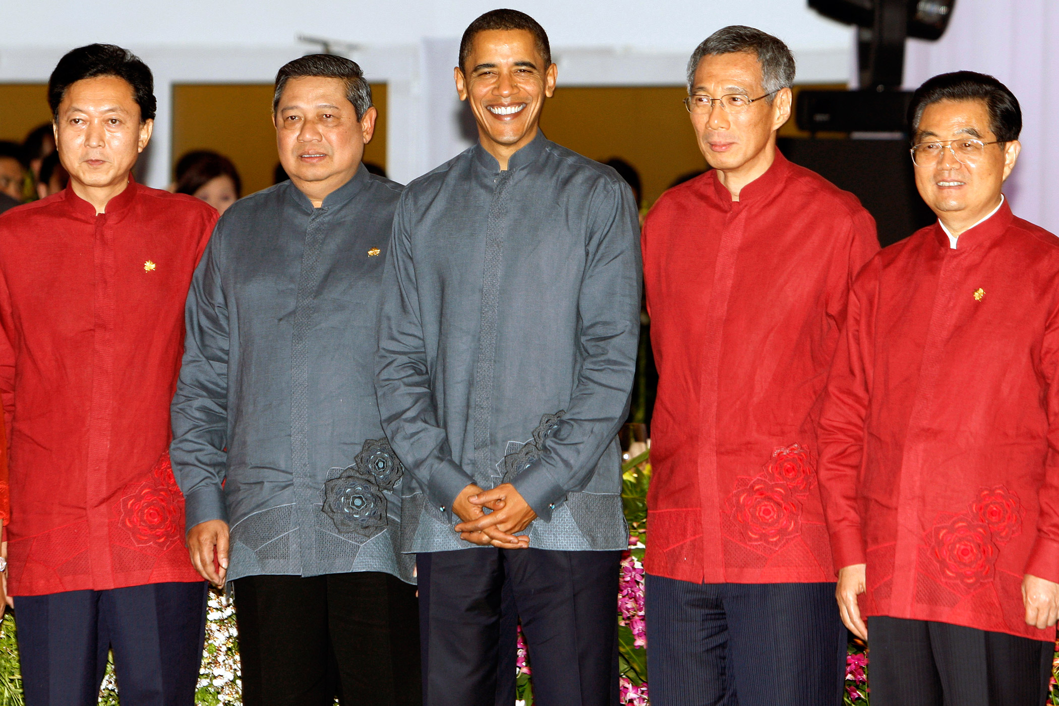 U.S. President Barack Obama poses with APEC leaders in traditional shirts for a group photo at the APEC Summit in Singapore on Nov. 14, 2009.