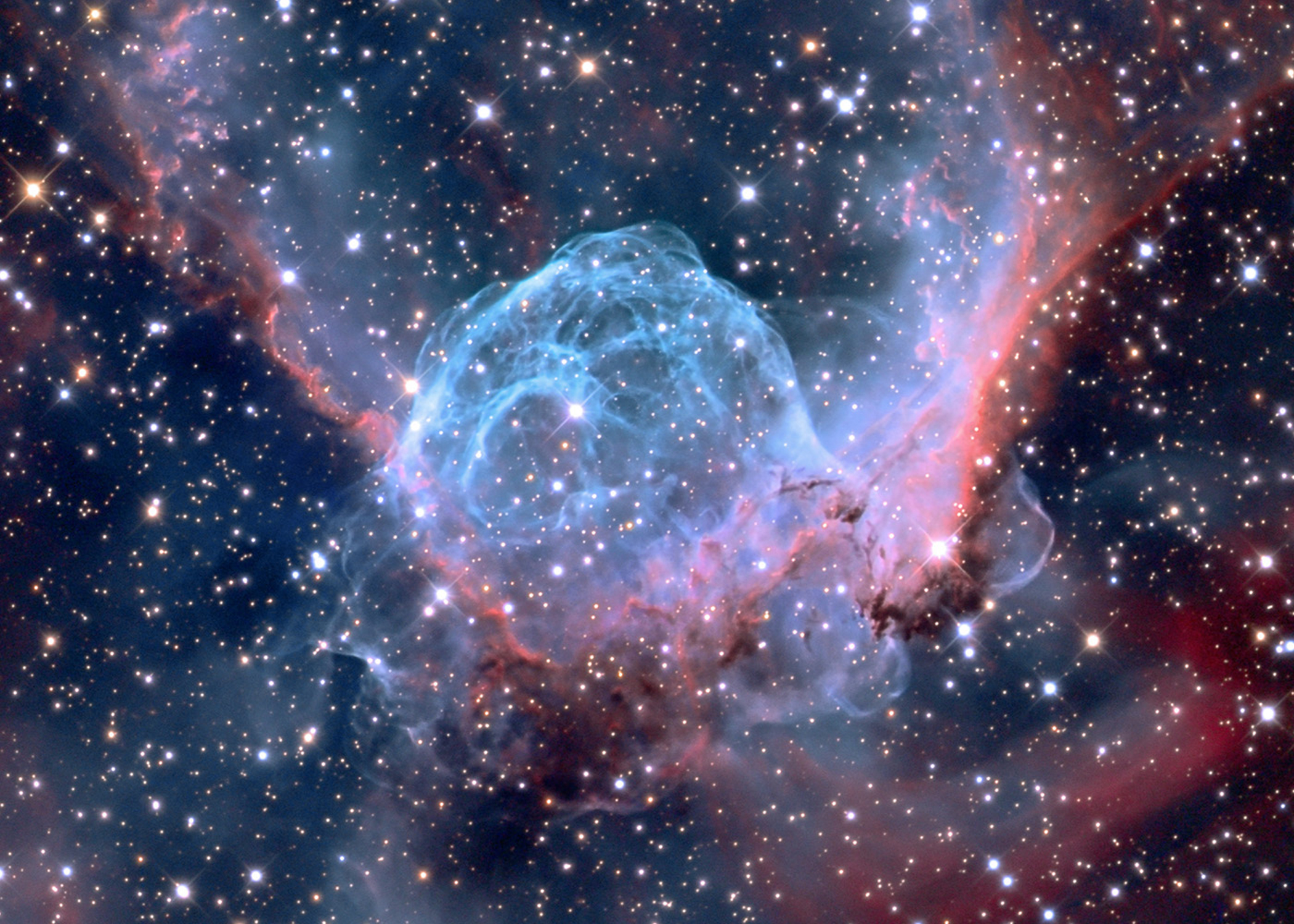 This nebula named "Thor's Helmet" is powered by a central "Wolf Rayet" star whose explosive tantrums blow huge bubbles of gas and make them glow like neon. This star is easily 20 times the mass of the Sun and located 15,000 light years away. Eventually the star's instability will lead it to explode as a supernova. The photo was captured at the Mount Lemmon SkyCenter in Arizona and released on Jan. 3, 2015.