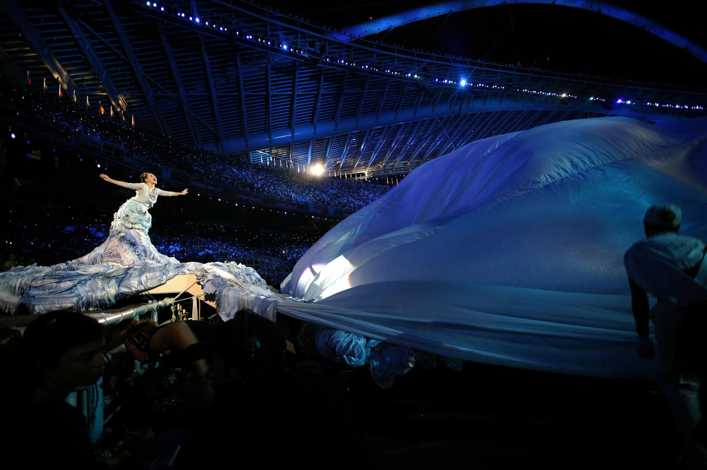Björk performs onstage at the opening of the 2004 Athens Olympics in Athens, Greece on Aug. 13, 2004.