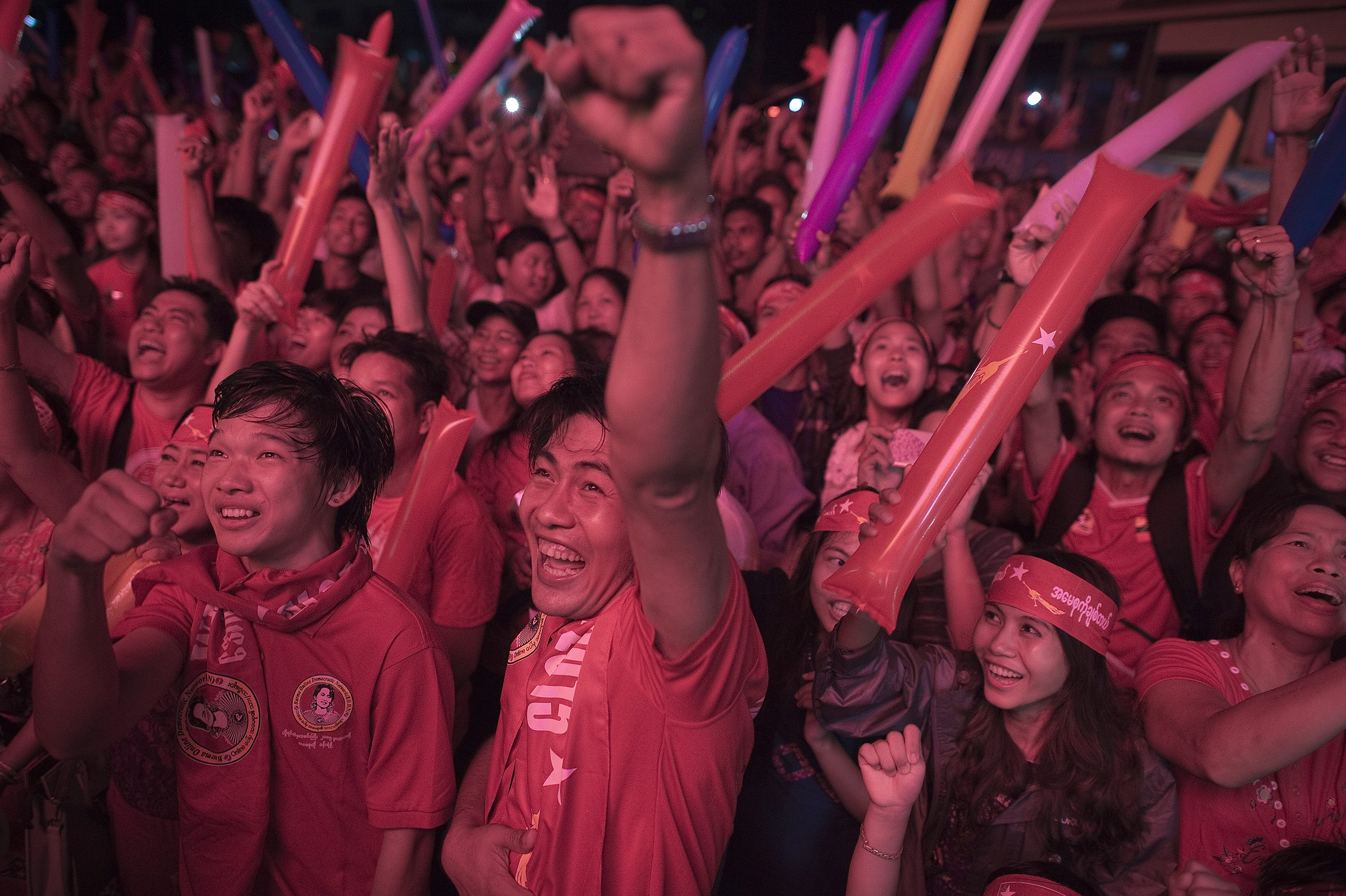 Supporters of Aung San Suu Kyi celebrate in Rangoon on Nov. 9 as they hear the results of Burma’s election. (Nicolas Asfouri—AFP/Getty Images)