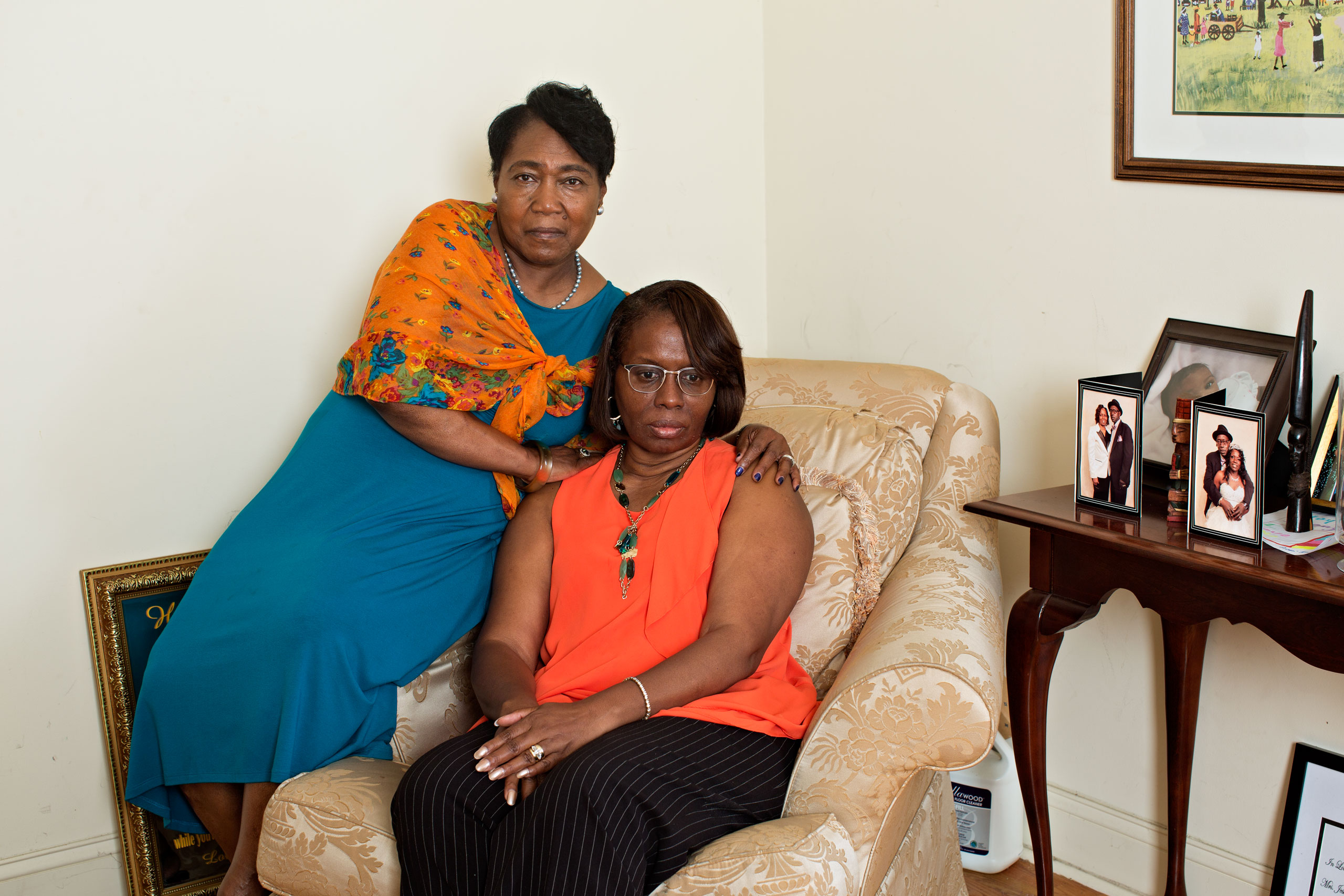 Polly Sheppard, left, and Felicia Sanders. The longtime friends, seen at Sanders’ Charleston home, both survived the massacre. The killer spared Sheppard at gunpoint so she would tell what happened. (Deana Lawson for TIME)